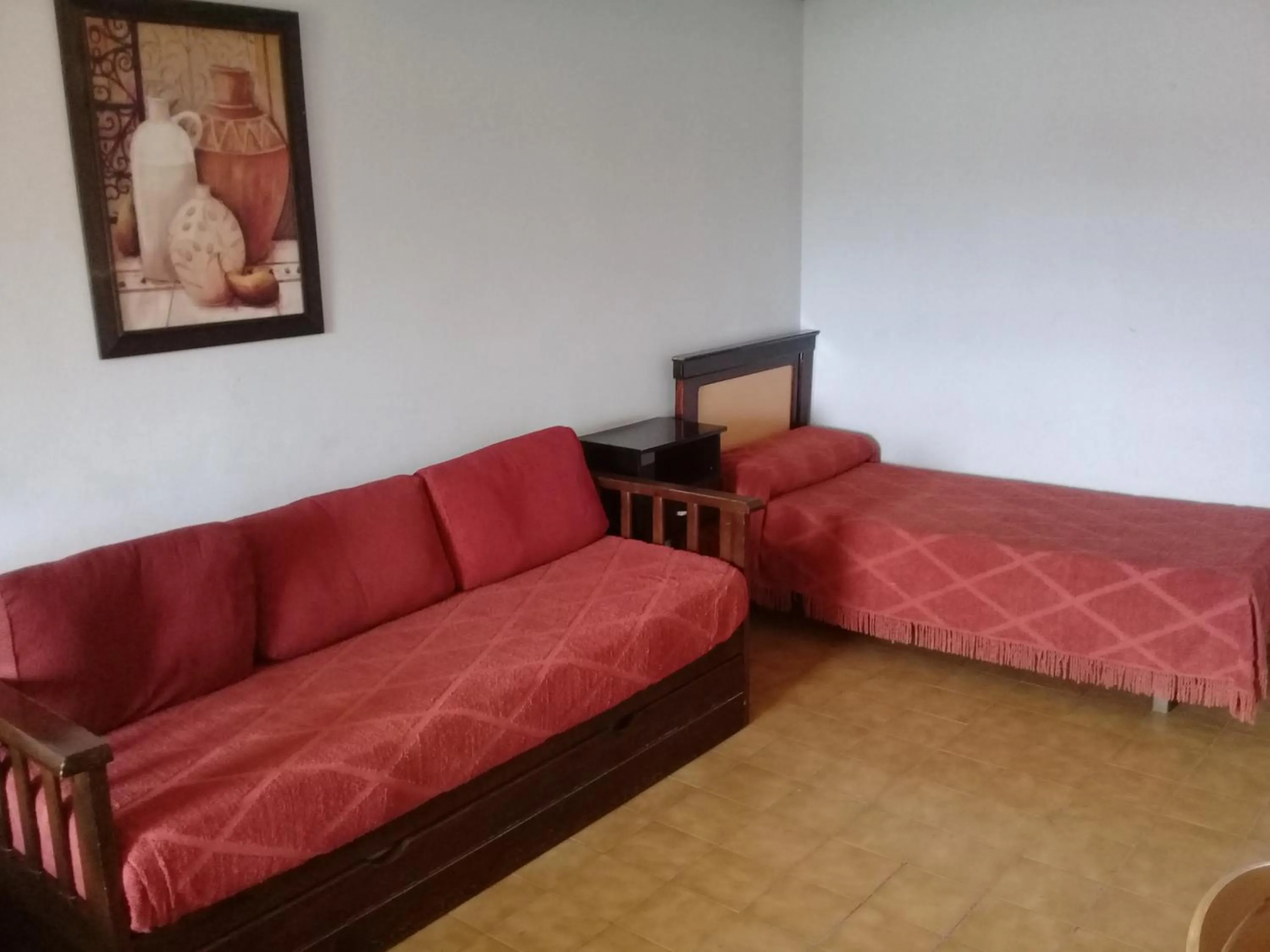 Bed in Apart Hotel Marilian