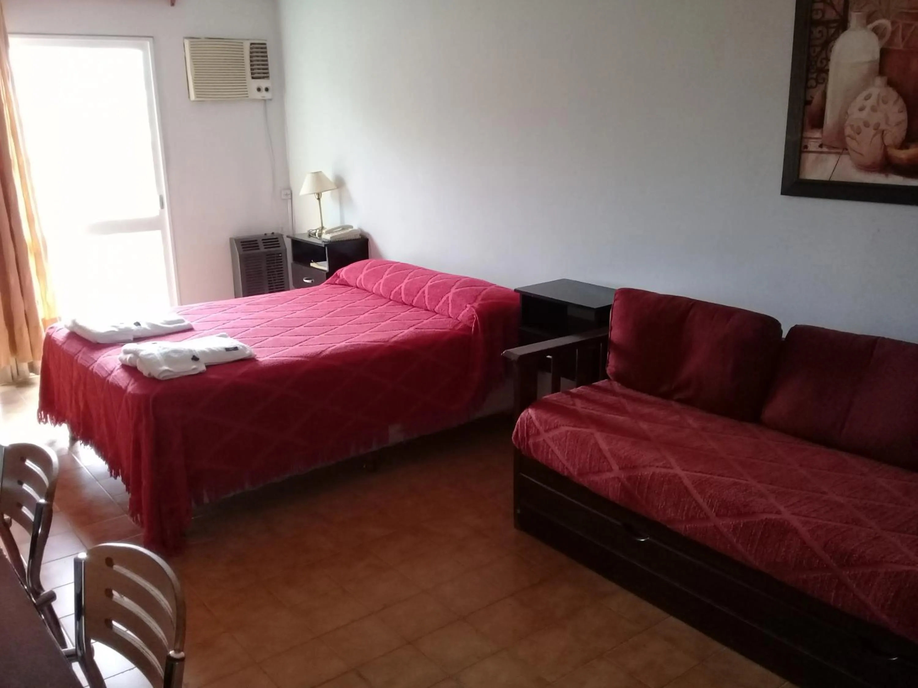 Bed in Apart Hotel Marilian