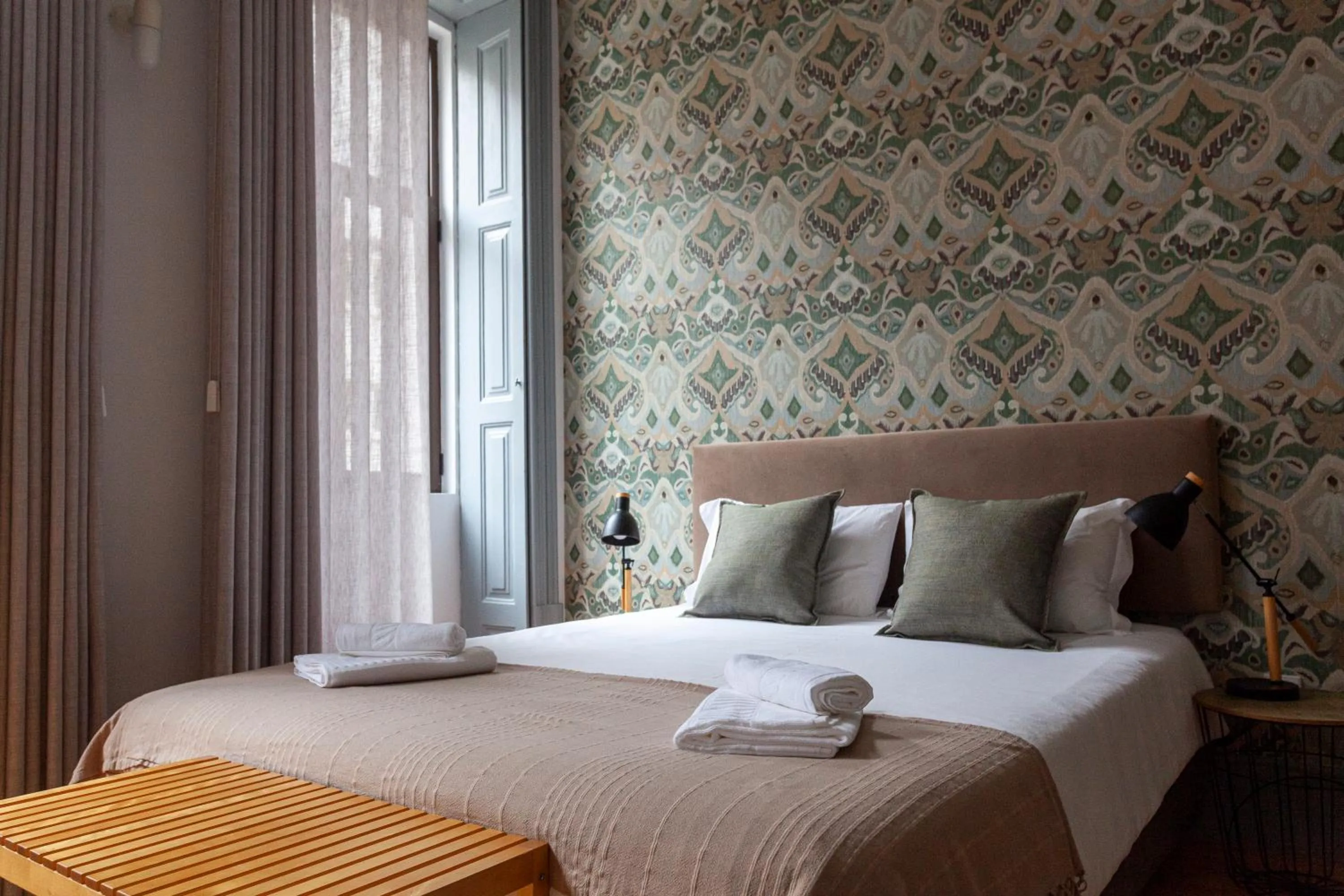 Bed in Citybreak-apartments Coliseu