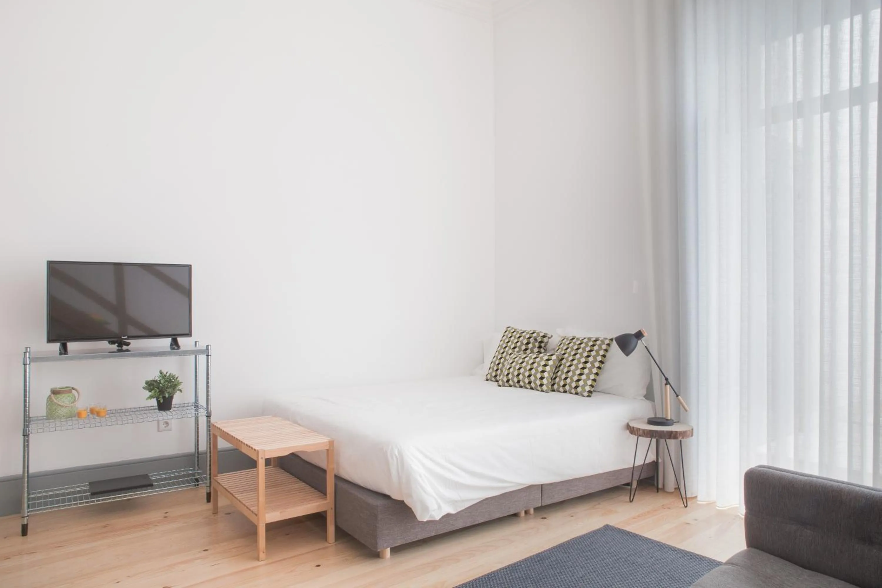 Bed in Citybreak-apartments Coliseu