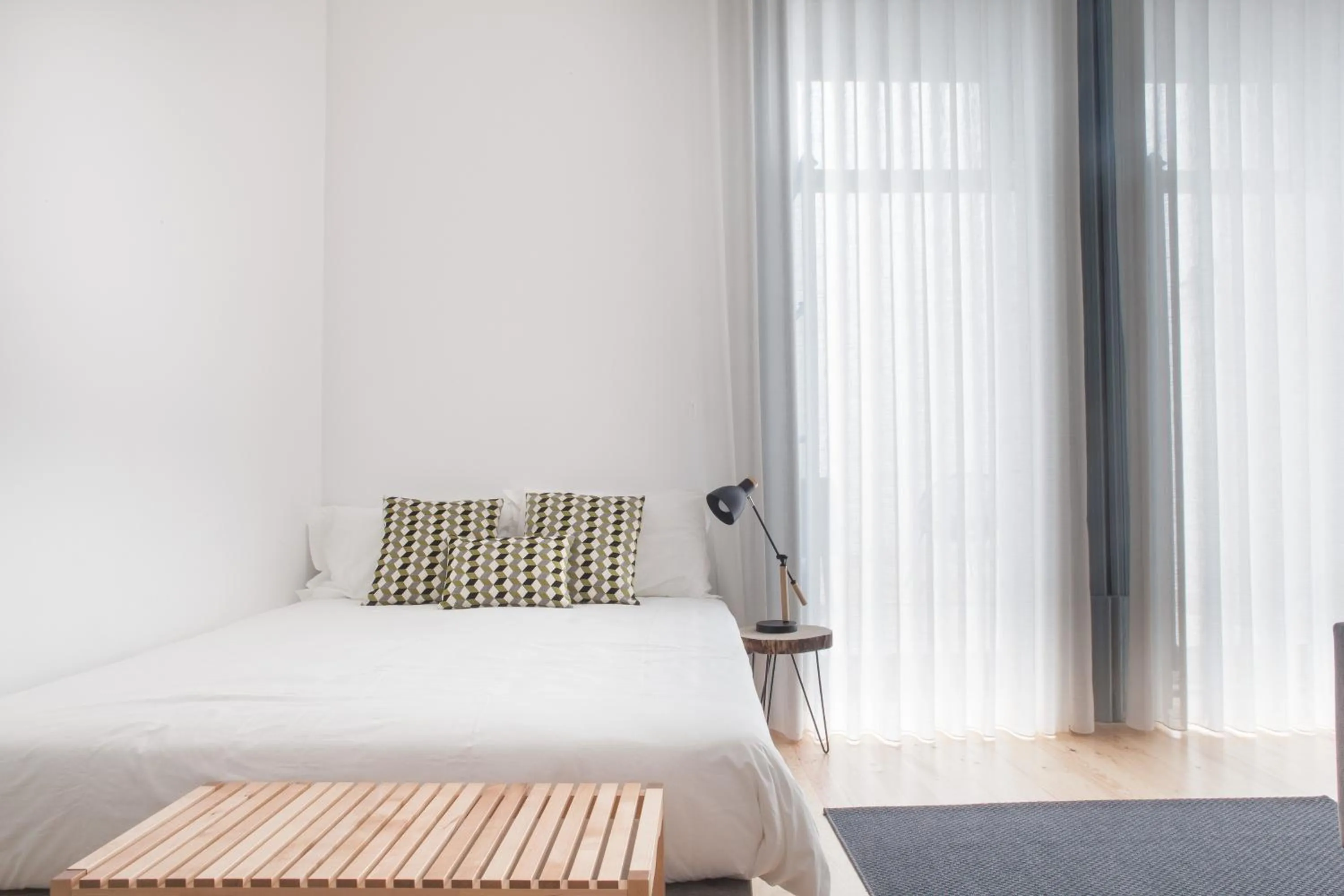 Bed in Citybreak-apartments Coliseu