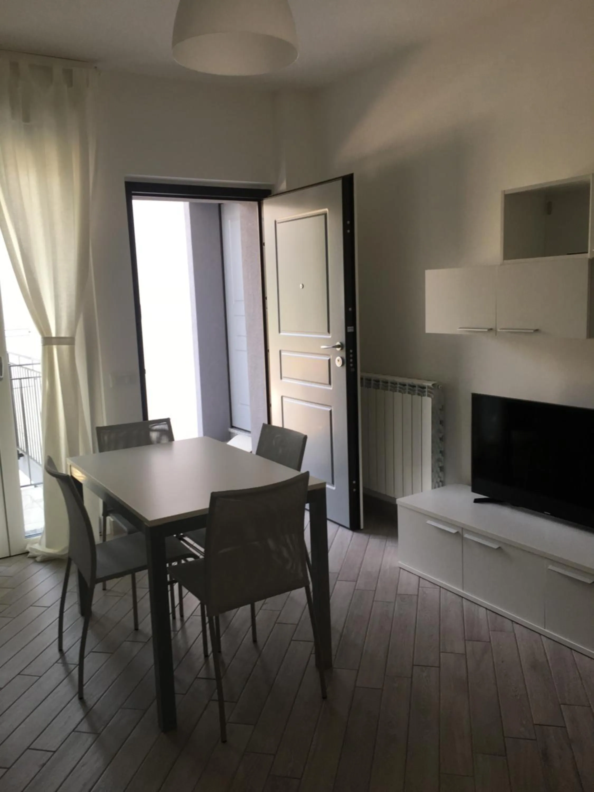 Kitchen or kitchenette in Home Hotel