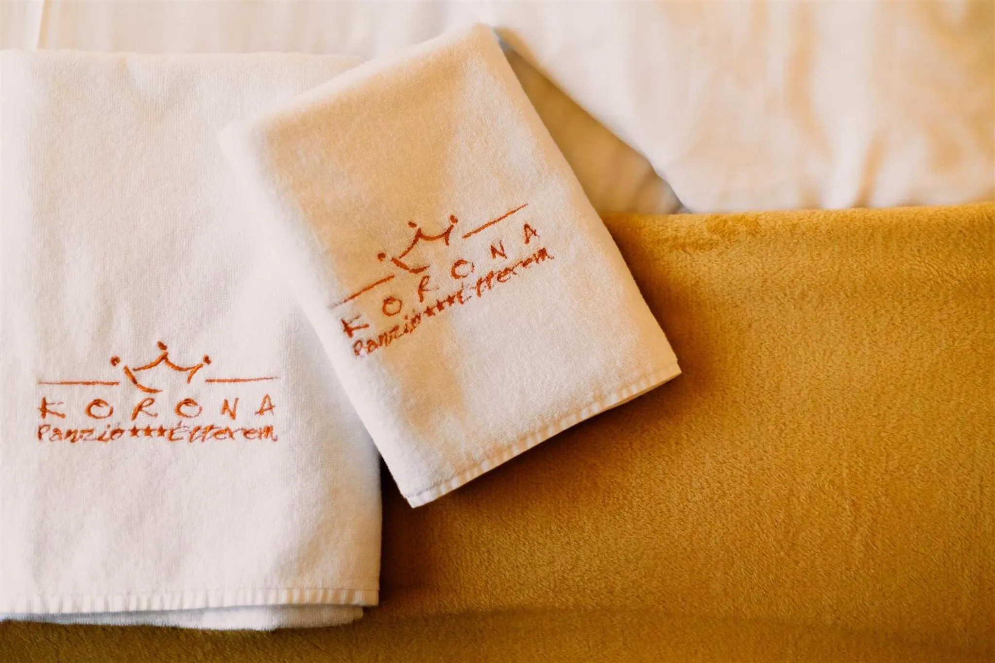 Property logo or sign in Korona Pension and Restaurant