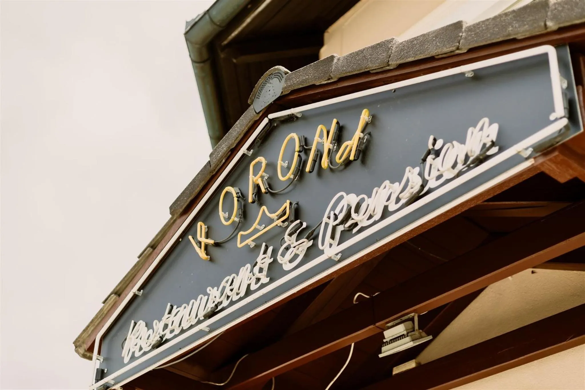 Property logo or sign in Korona Pension and Restaurant