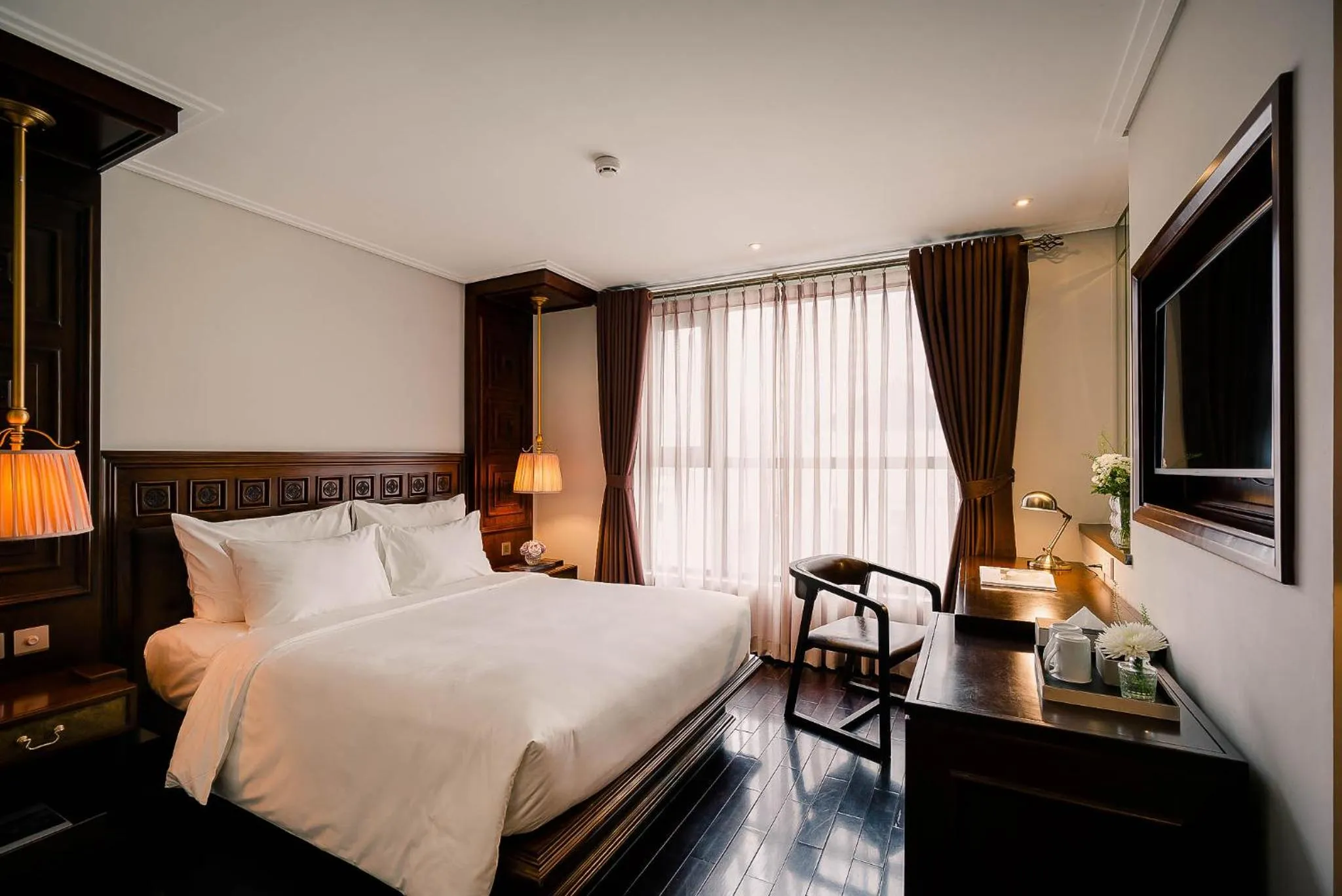 Bed in Le Jardin Hotel Haute Couture