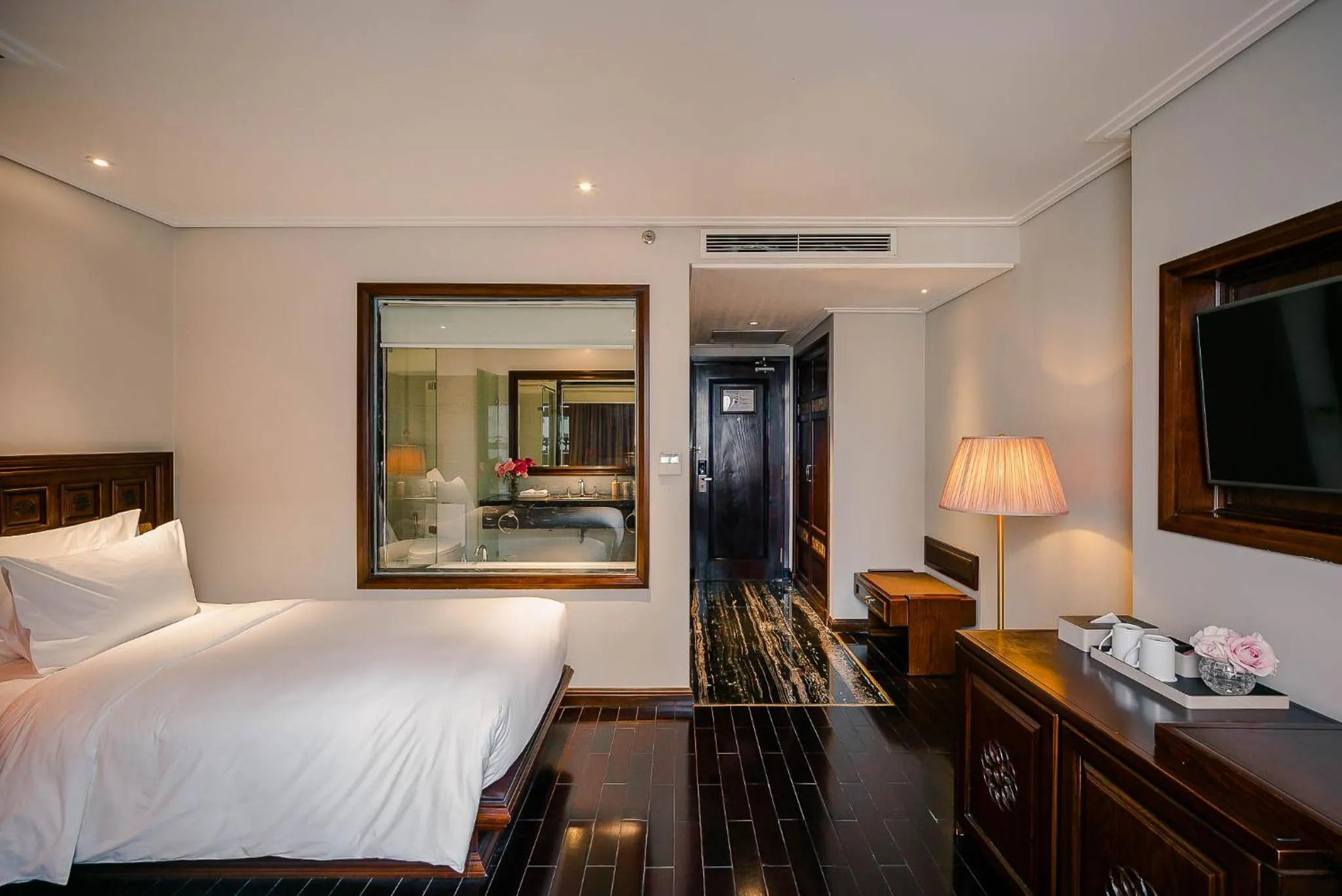 Bed in Le Jardin Hotel Haute Couture