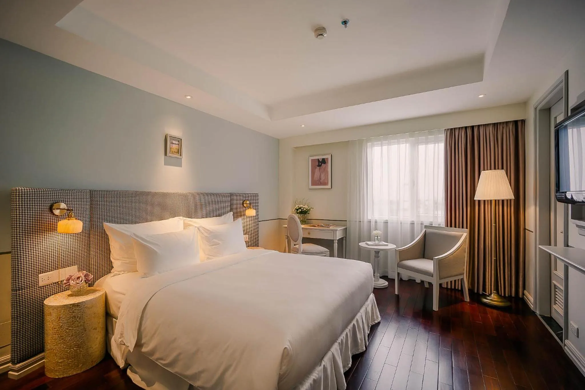 Bed in Le Jardin Hotel Haute Couture