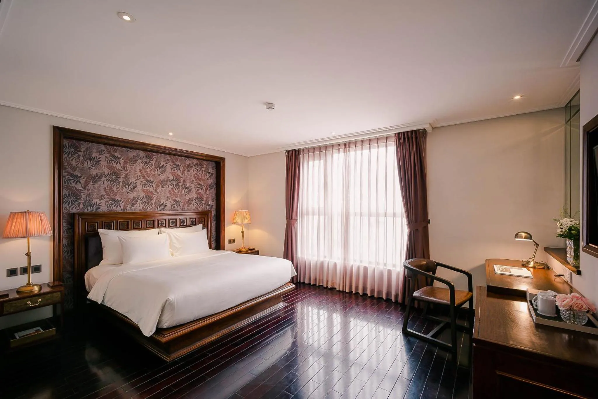 Bed in Le Jardin Hotel Haute Couture