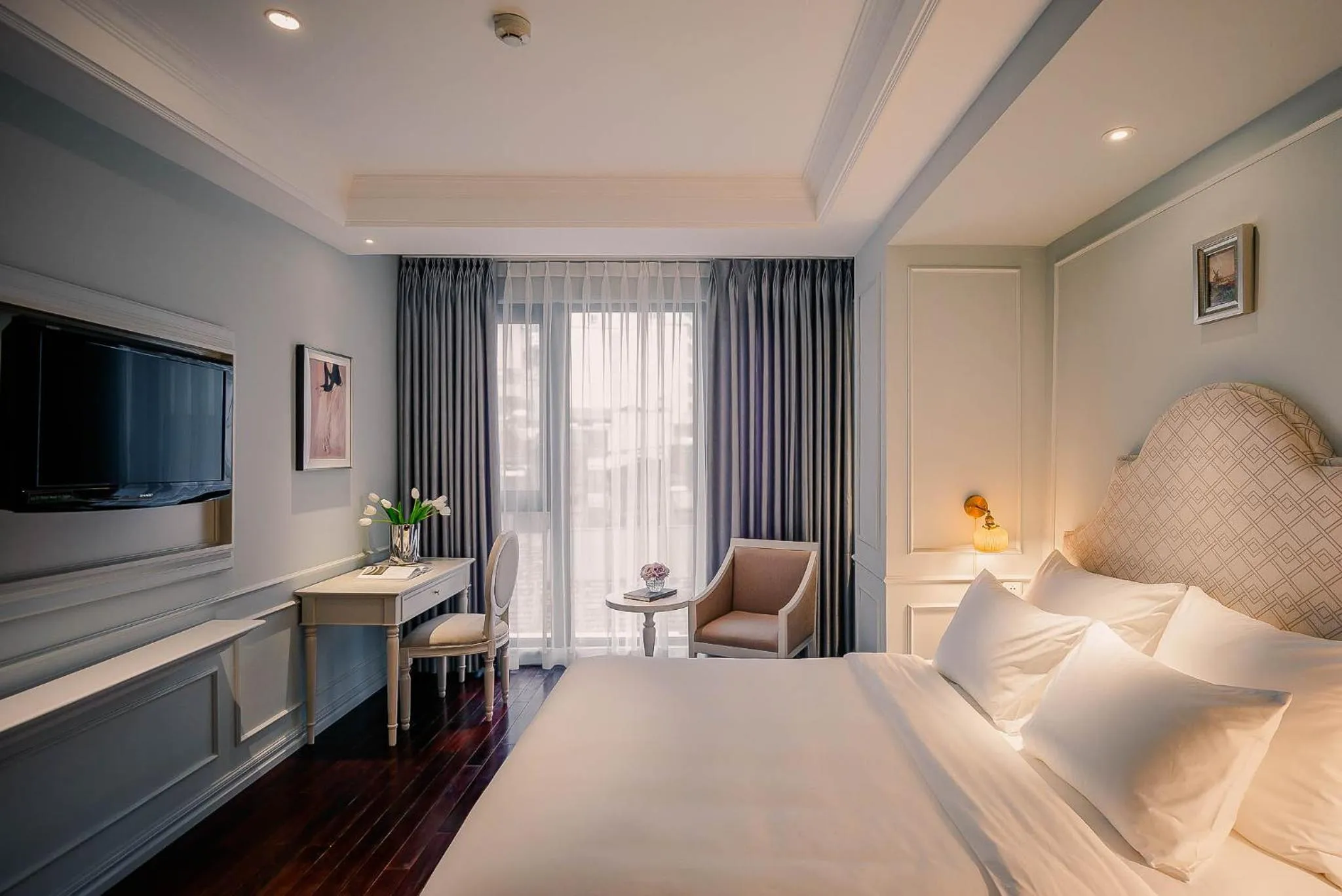 Bed in Le Jardin Hotel Haute Couture