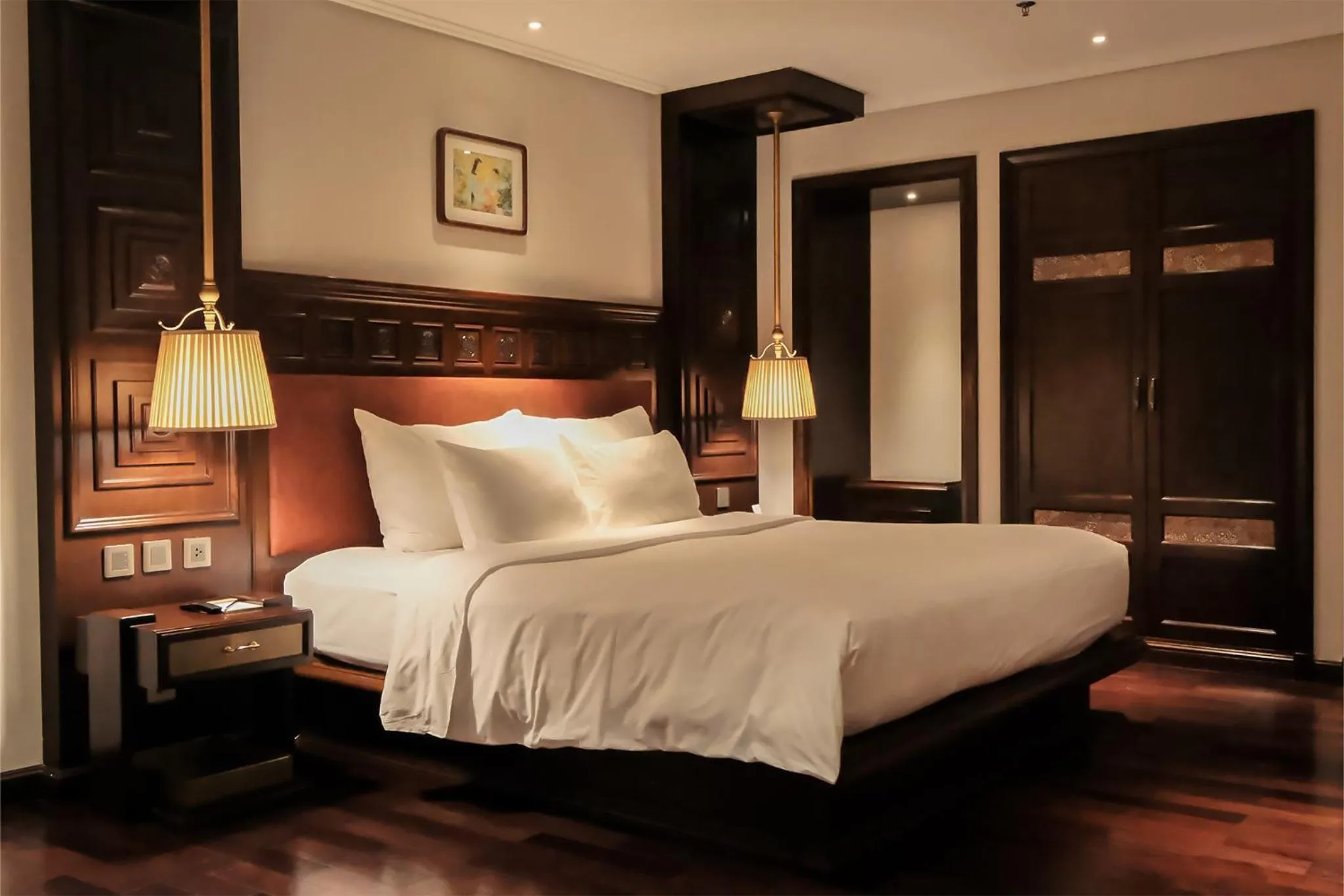 Bed in Le Jardin Hotel Haute Couture