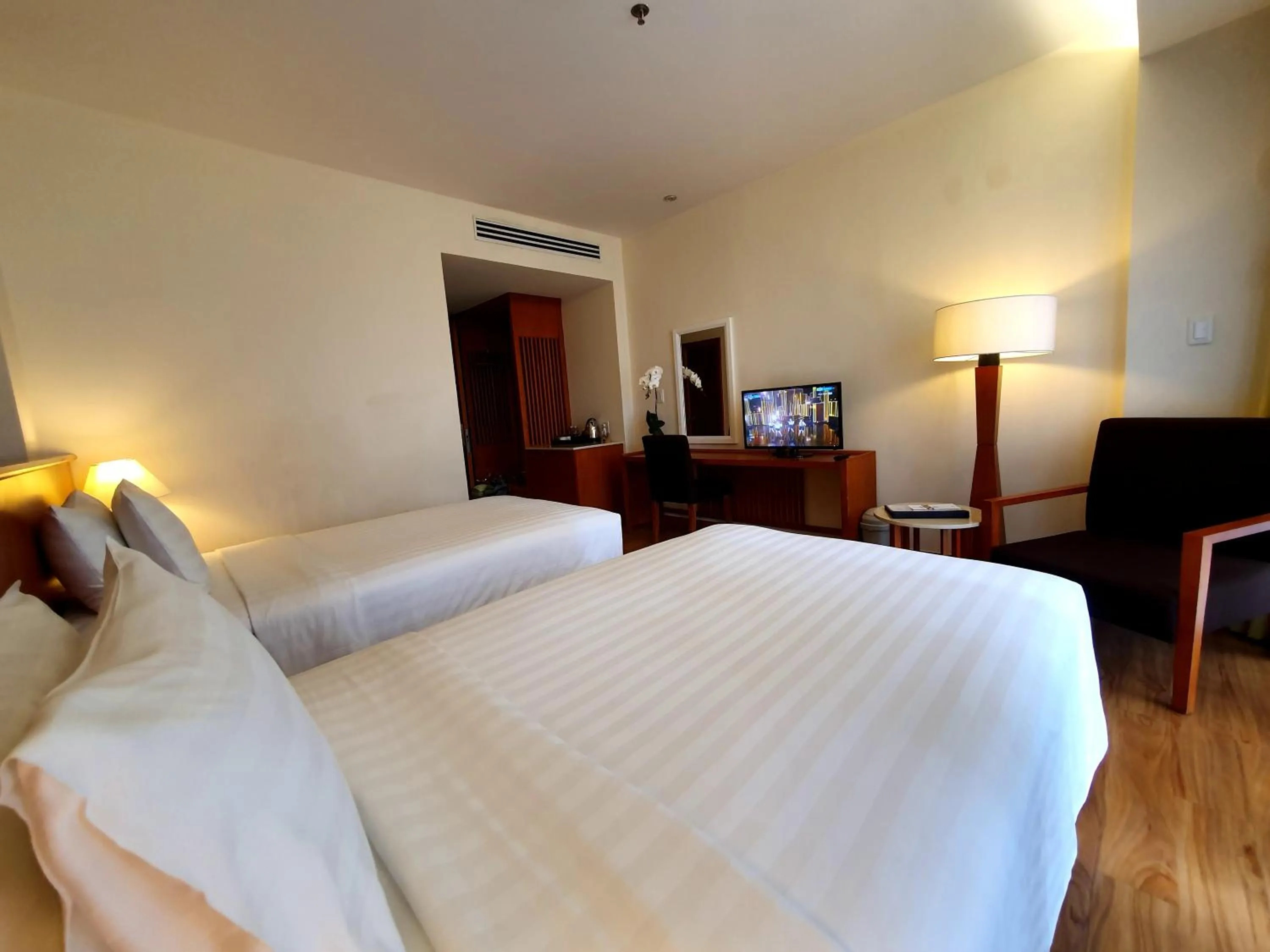 Photo of the whole room, Bed in Saigon Hotel