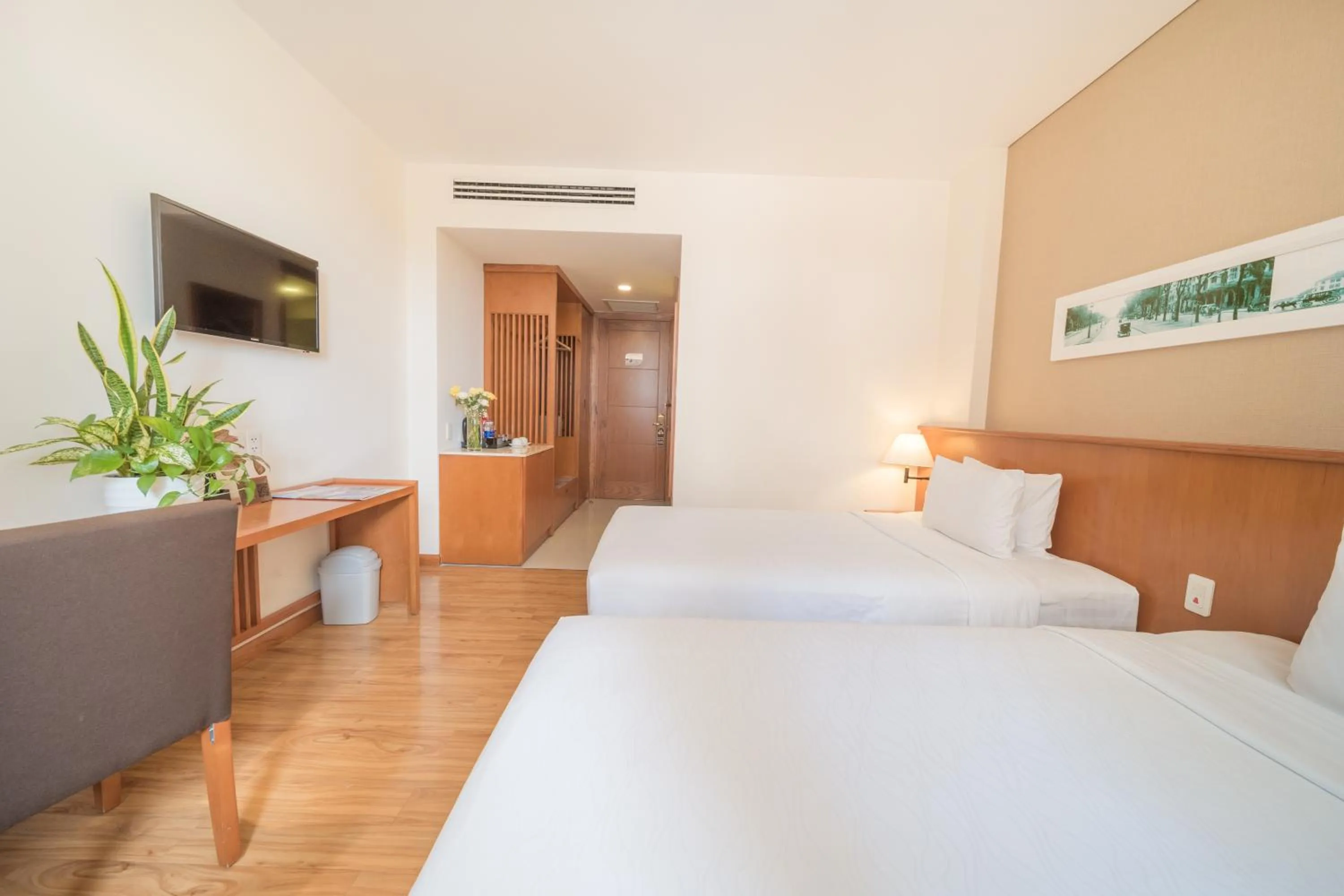 Living room, Bed in Saigon Hotel