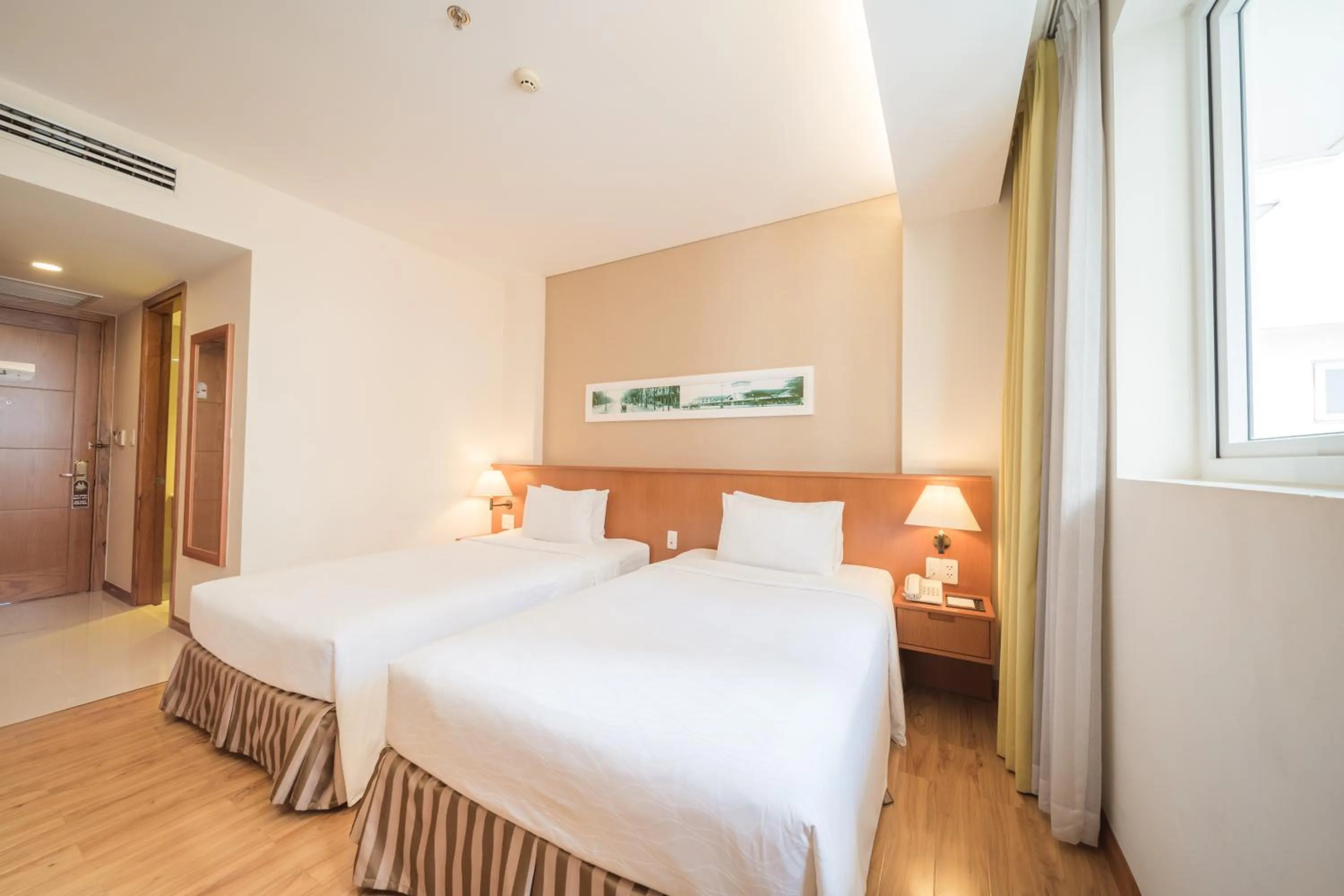 Living room, Bed in Saigon Hotel