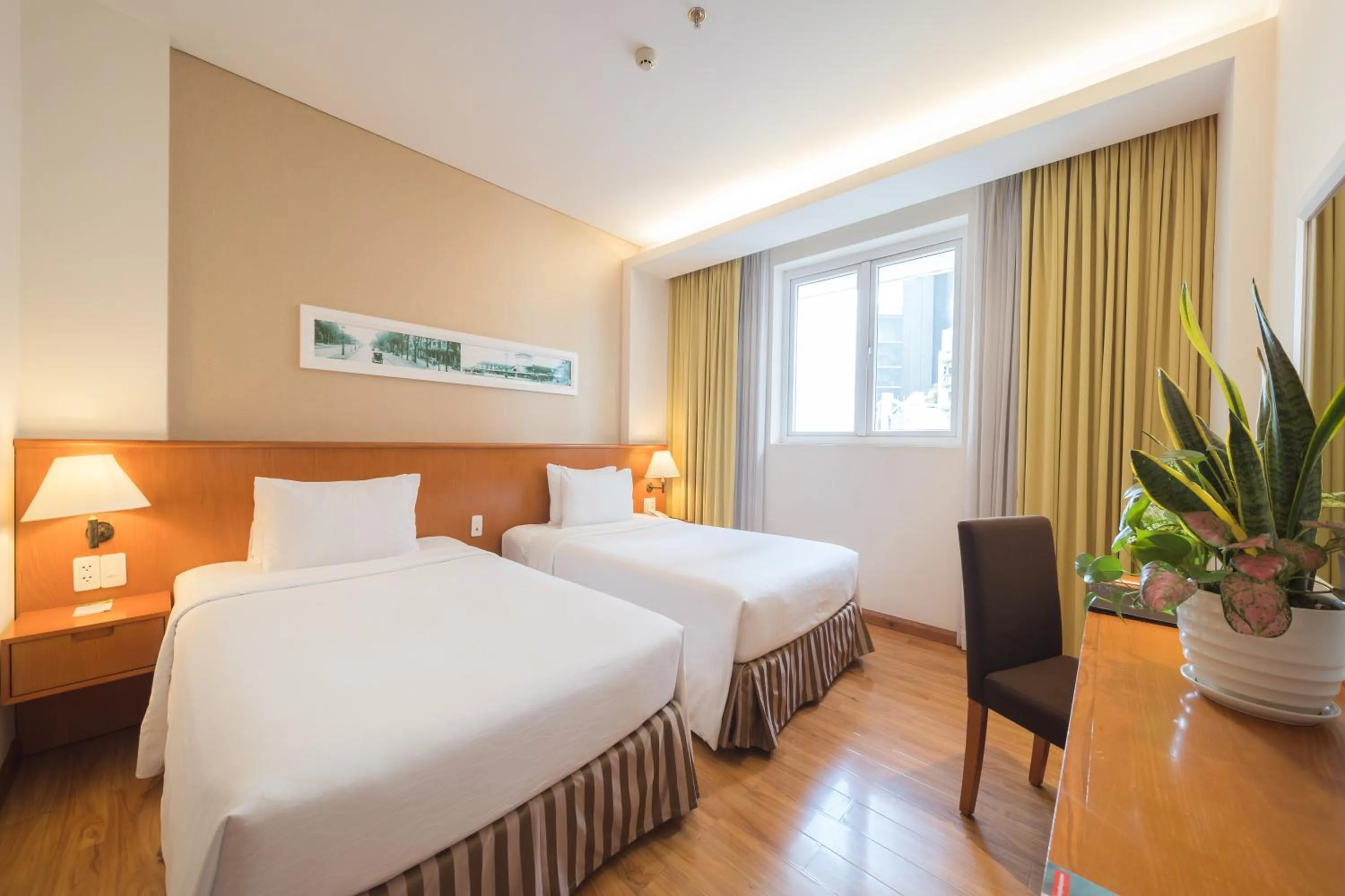 Living room, Bed in Saigon Hotel