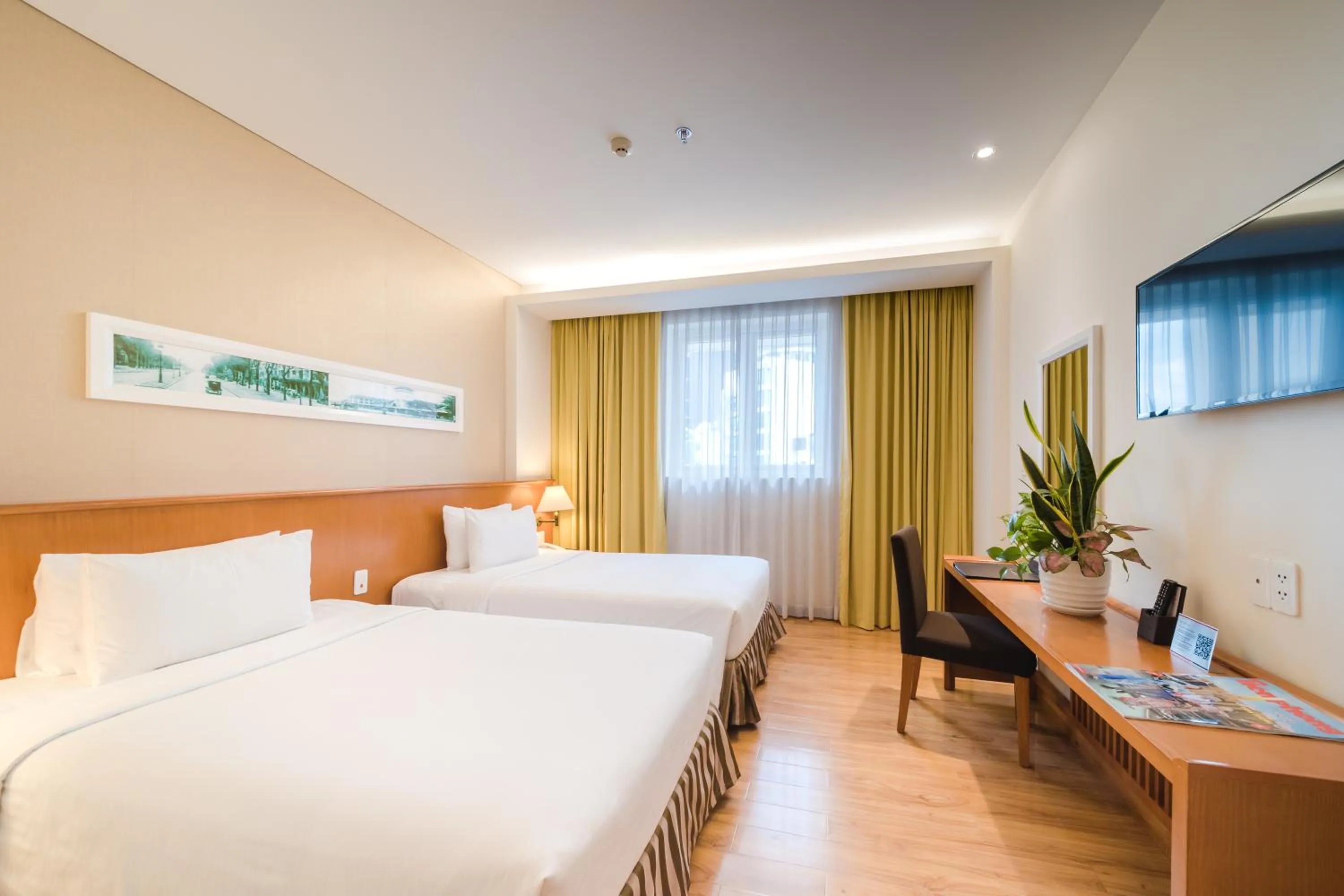 Living room, Bed in Saigon Hotel