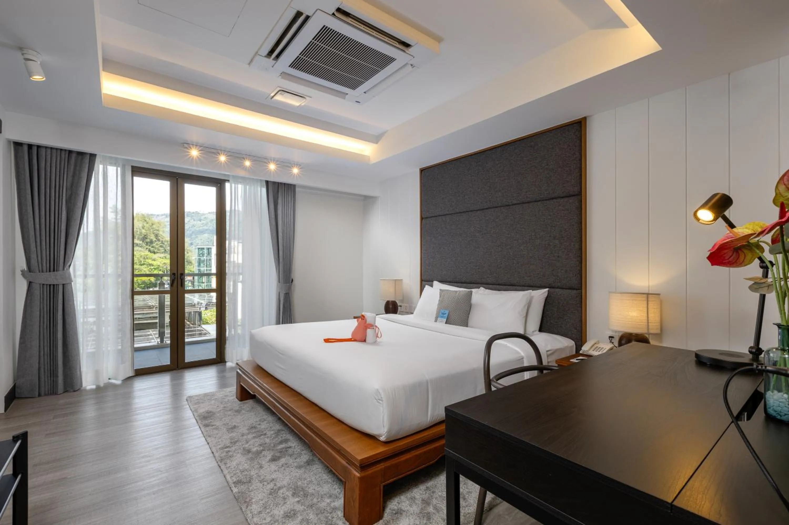 Bed in Baan Laimai Beach Resort & Spa - SHA Extra Plus