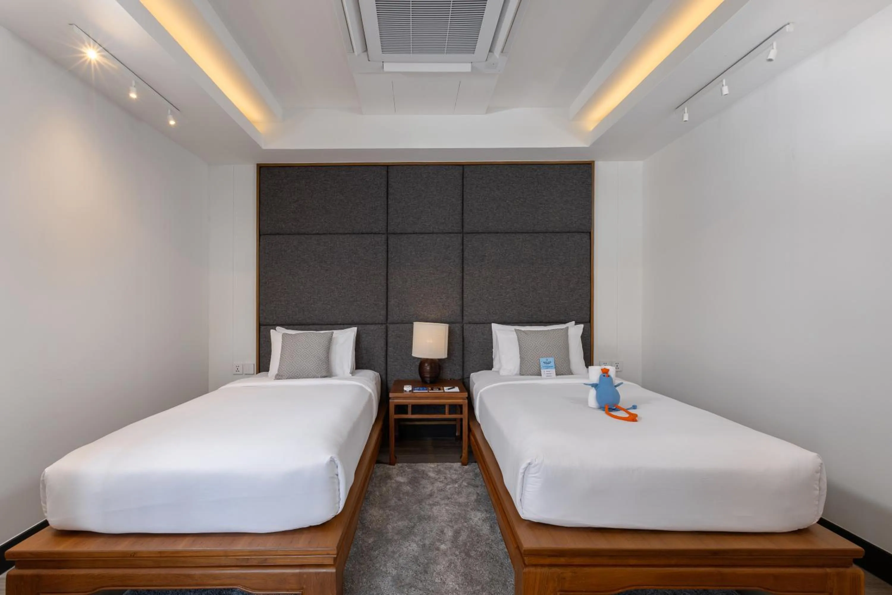 Bed in Baan Laimai Beach Resort & Spa - SHA Extra Plus