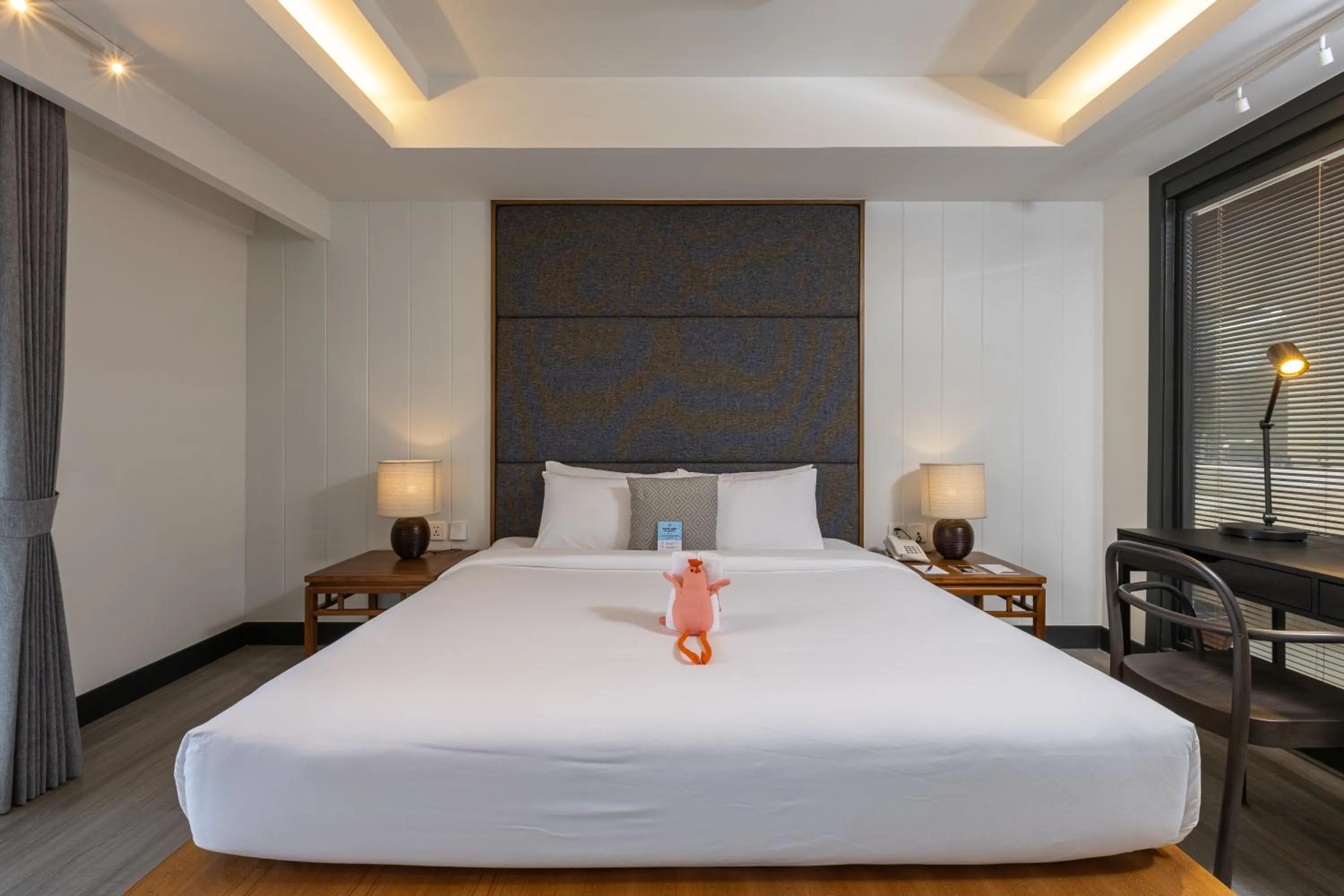 Bed in Baan Laimai Beach Resort & Spa - SHA Extra Plus