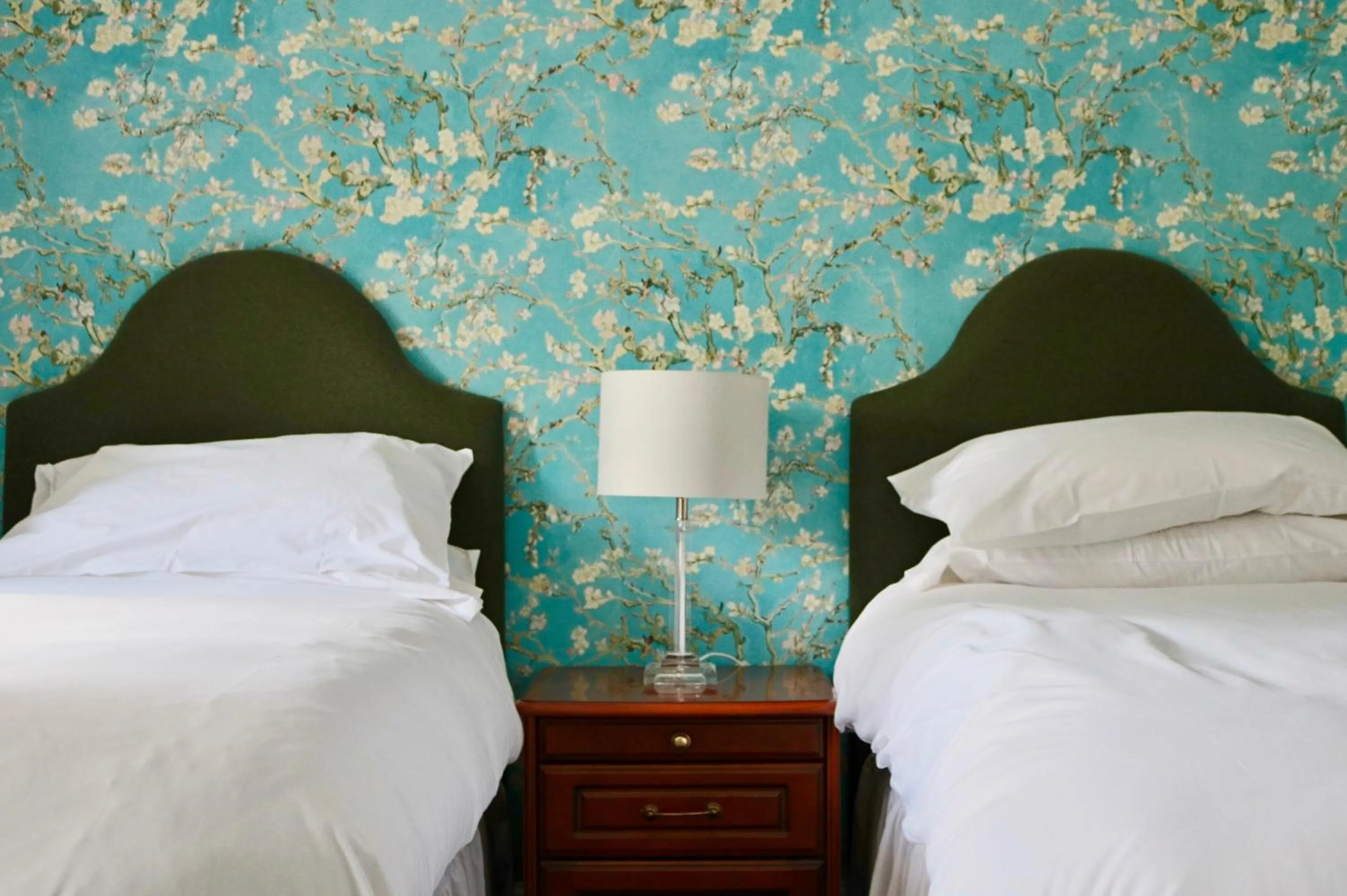 Bed in The Cottage Hotel