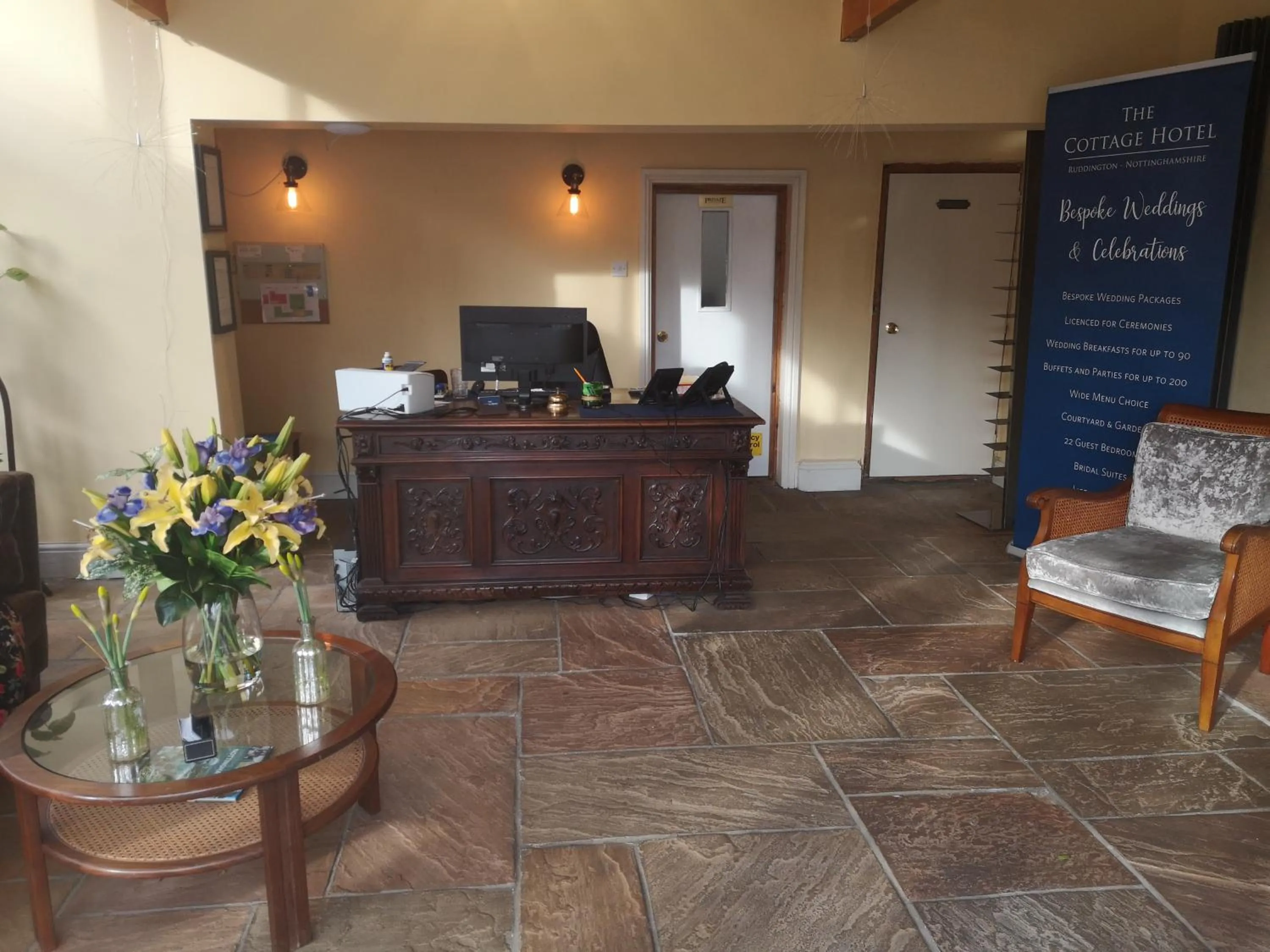 Lobby or reception in The Cottage Hotel