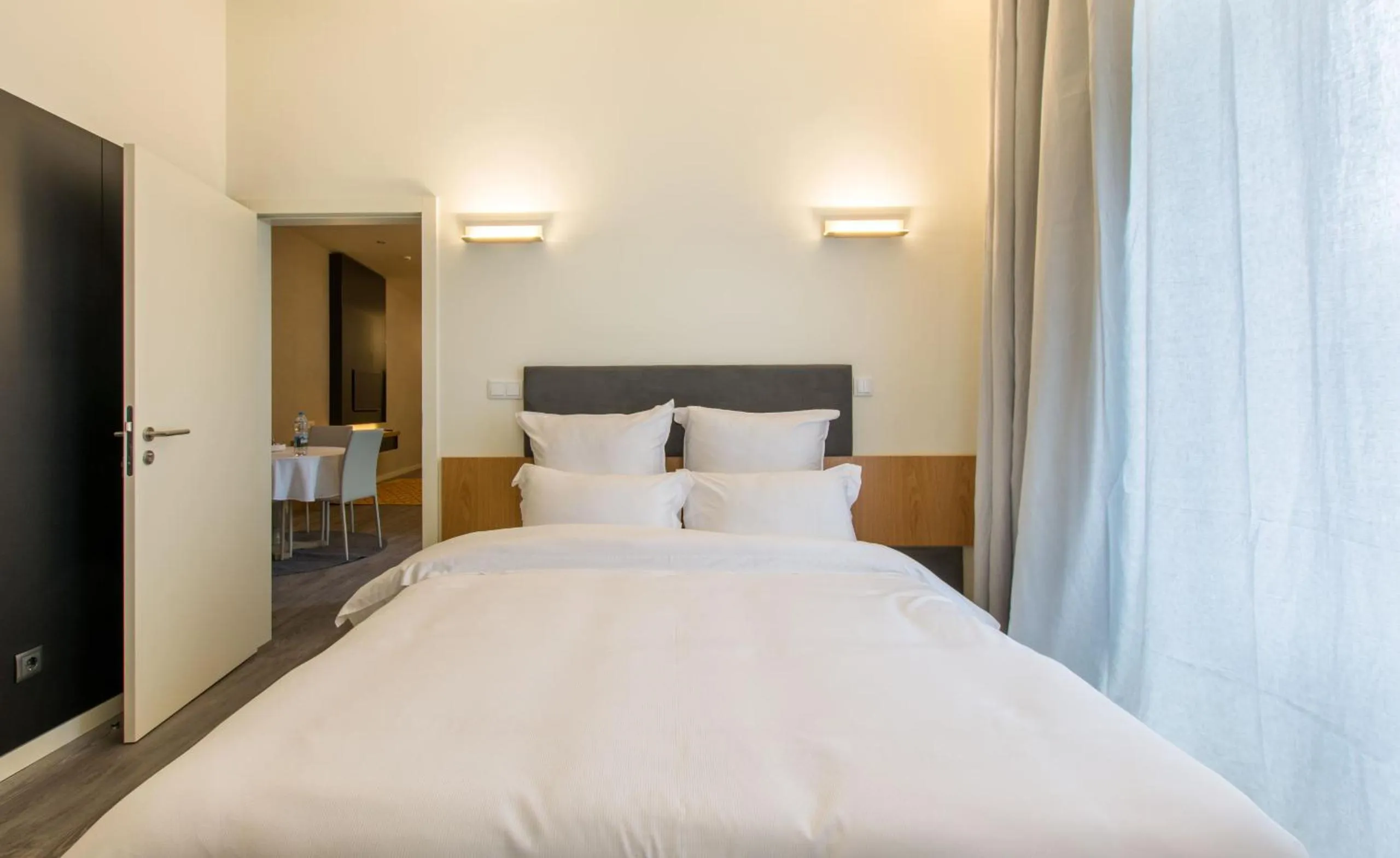 Bed in LETHESHOME Apartments