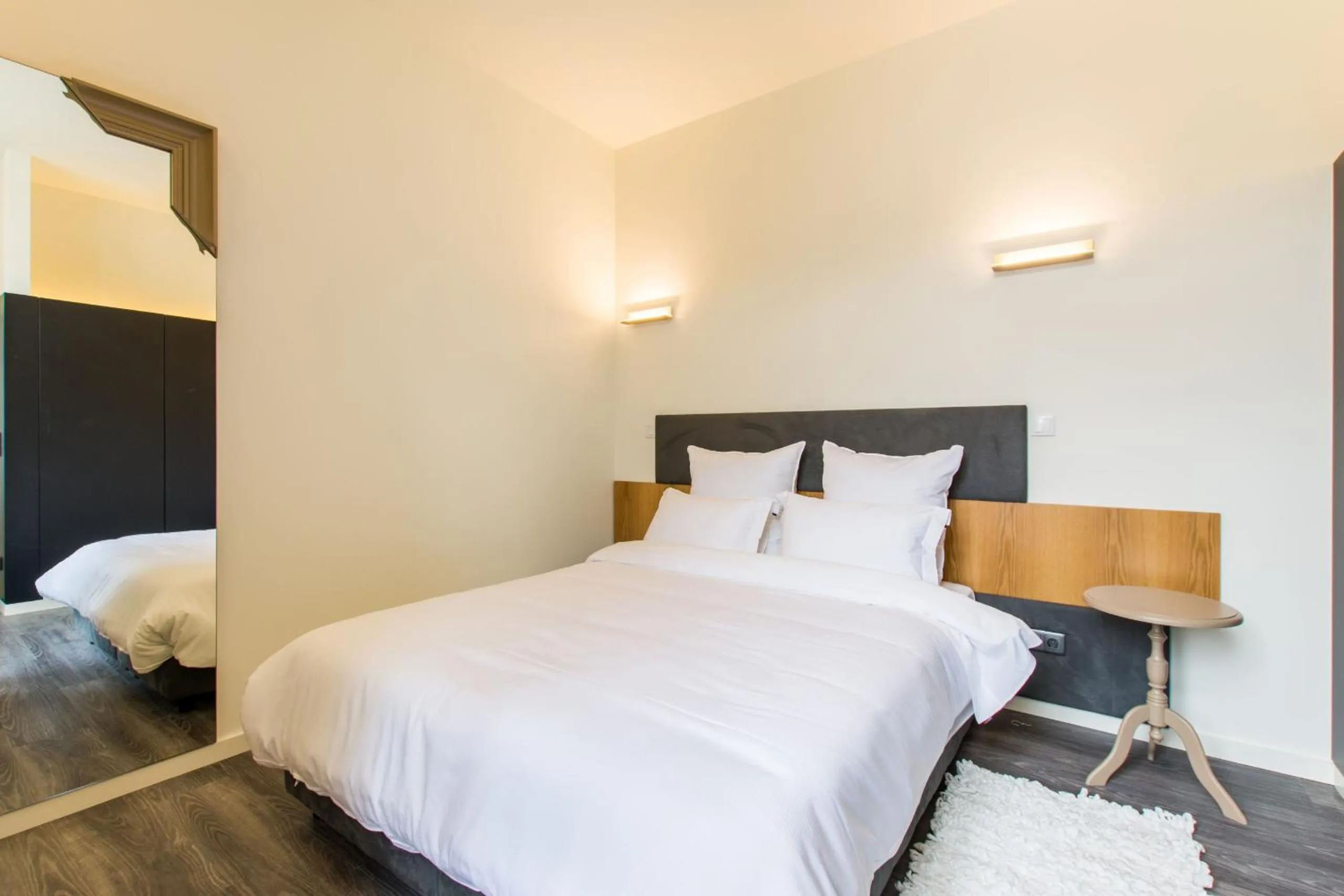 Bed in LETHESHOME Apartments