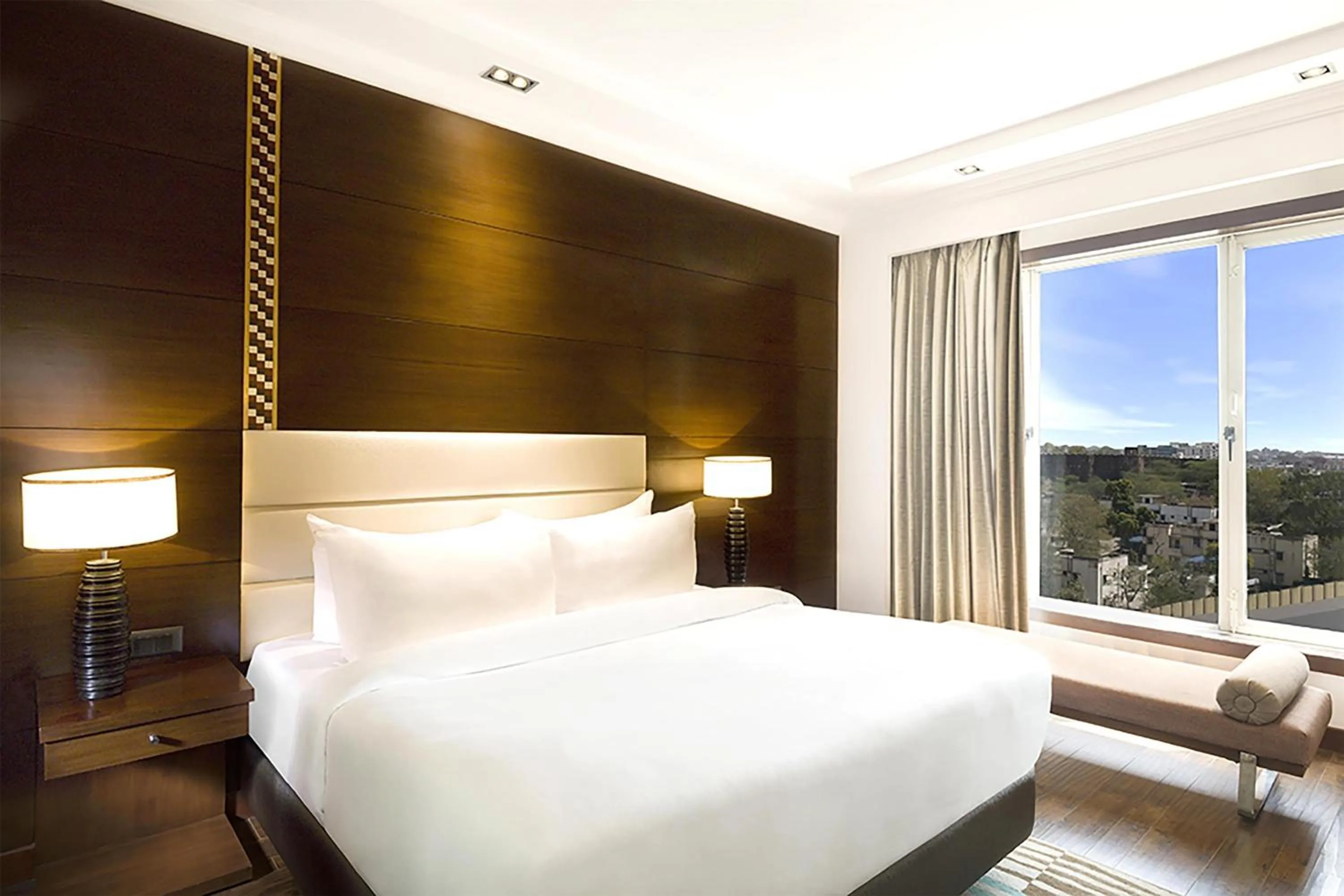 Photo of the whole room, Bed in Radisson Jaipur City Center