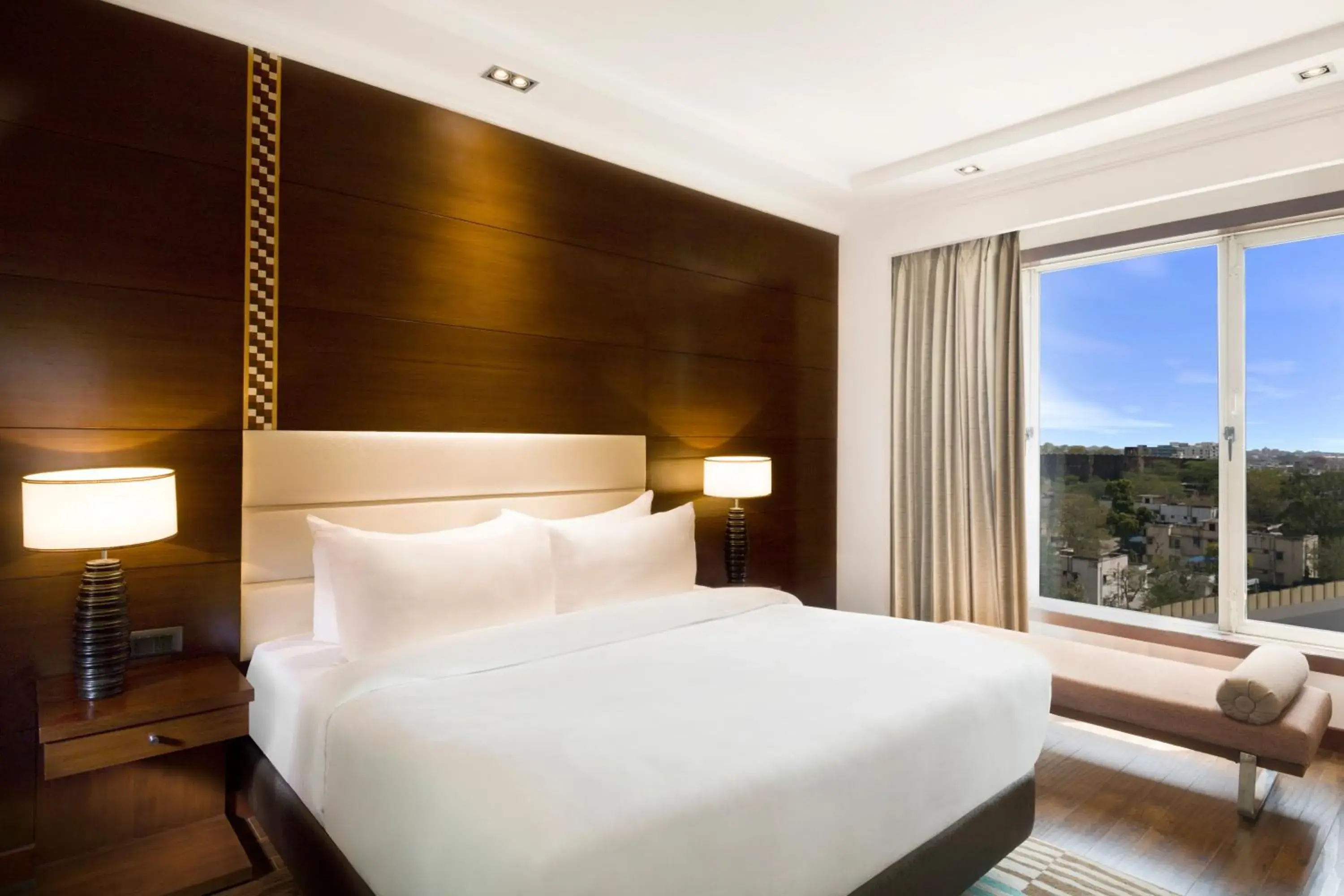 Junior Suite: (1 Way Airport Transfer, Enjoy Happy Hours 1+1 offer on Alcoholic Beverages 12 Pm-6 PM, Soft Beverages ,Laundry service) - single occupancy in Radisson Jaipur City Center Junior Suite: (1 Way Airport Transfer, Enjoy Happy Hours 1+1 offer on Alcoholic Beverages 12 Pm-6 PM, Soft Beverages ,Laundry service) - single occupancy in Radisson Jaipur City Center