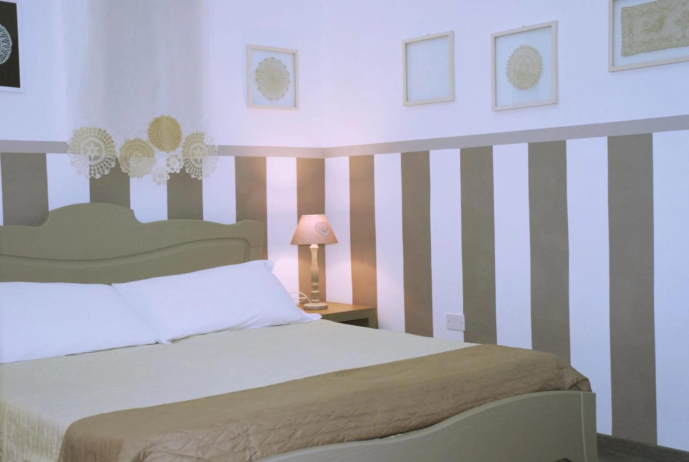 Decorative detail, Bed in B&B Dimora San Vincenzo