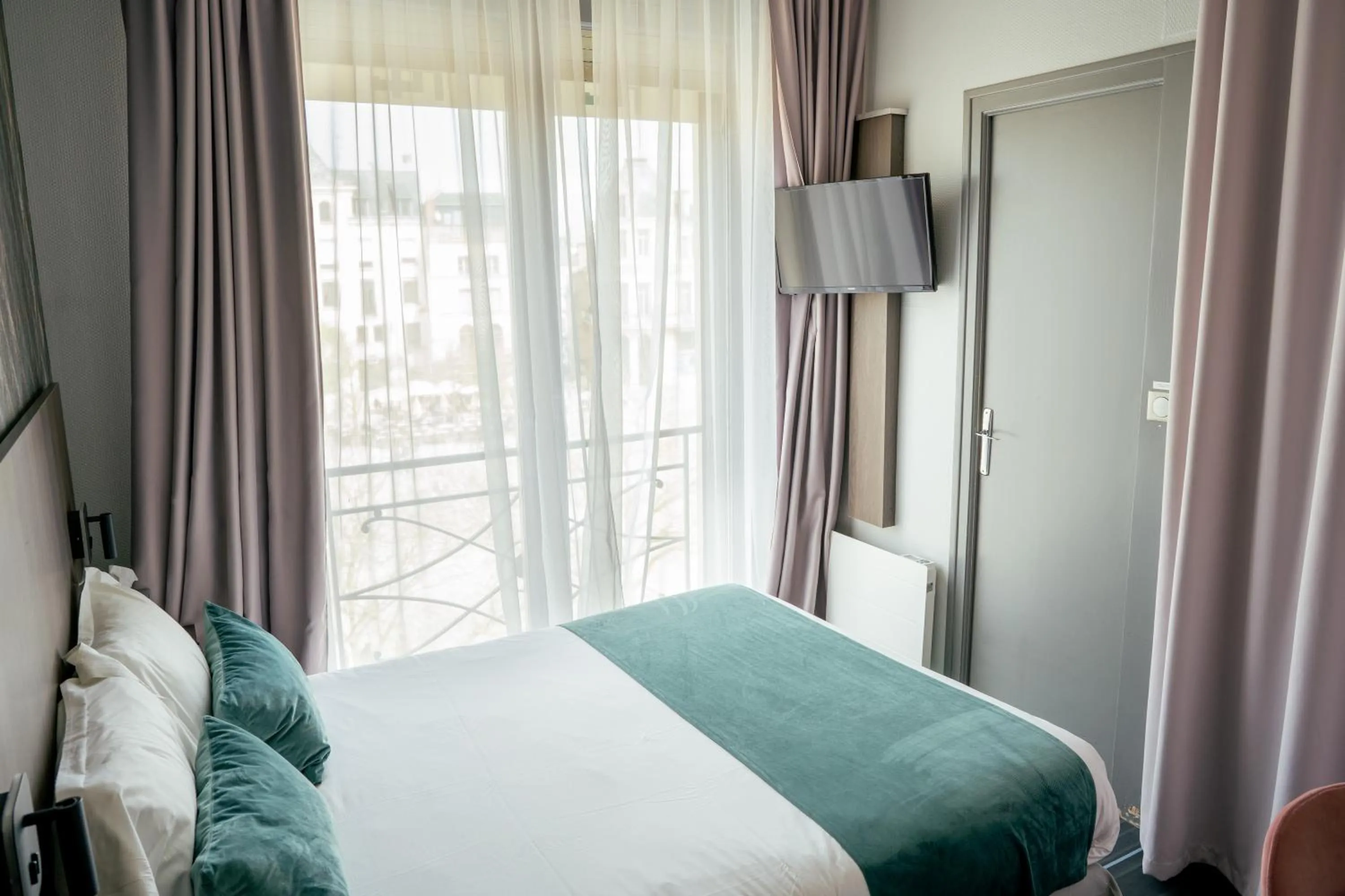 Bed in Hôtel Central