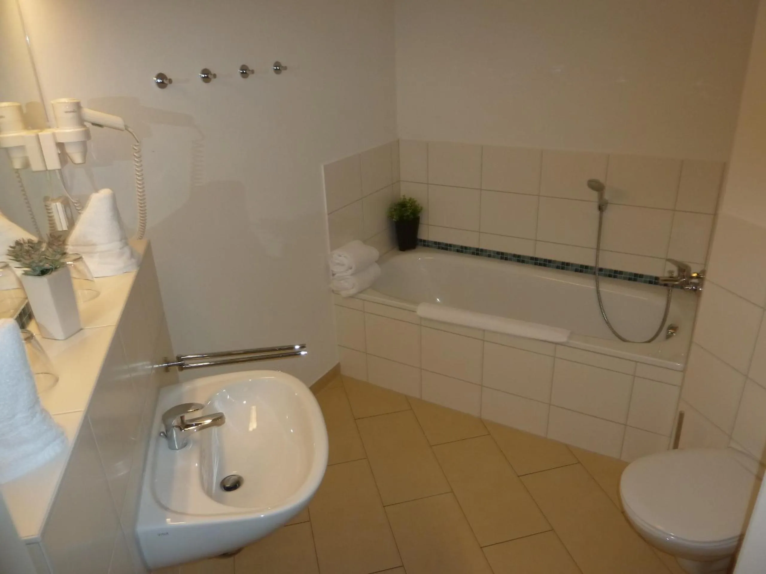 Toilet in Hotel Goor und Apartmenthaus