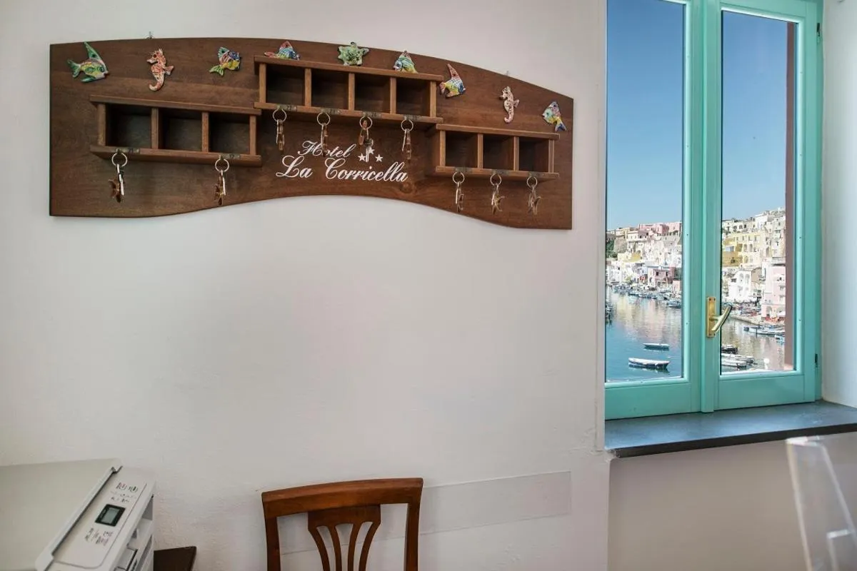 Communal lounge/ TV room in Hotel La Corricella