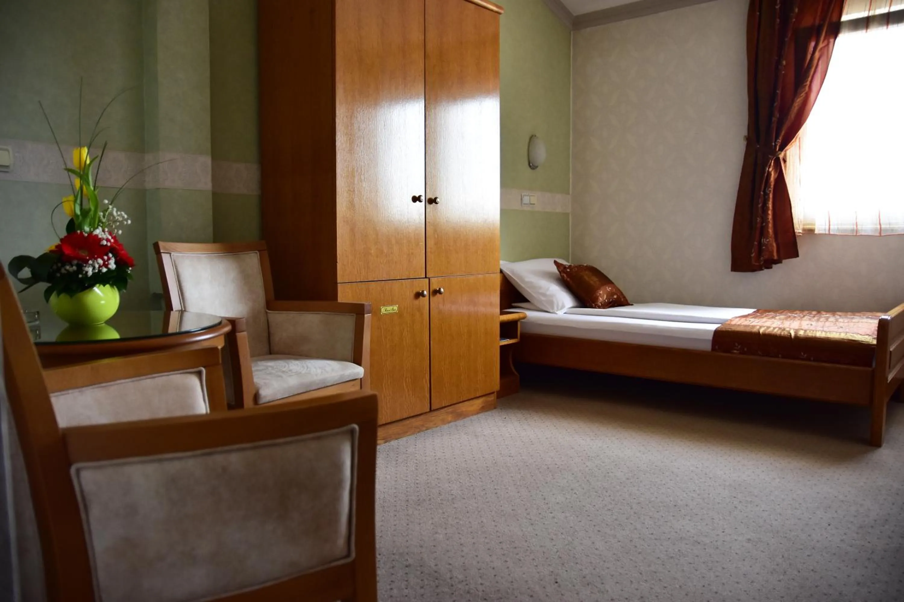 Bed in Garni Hotel Lav