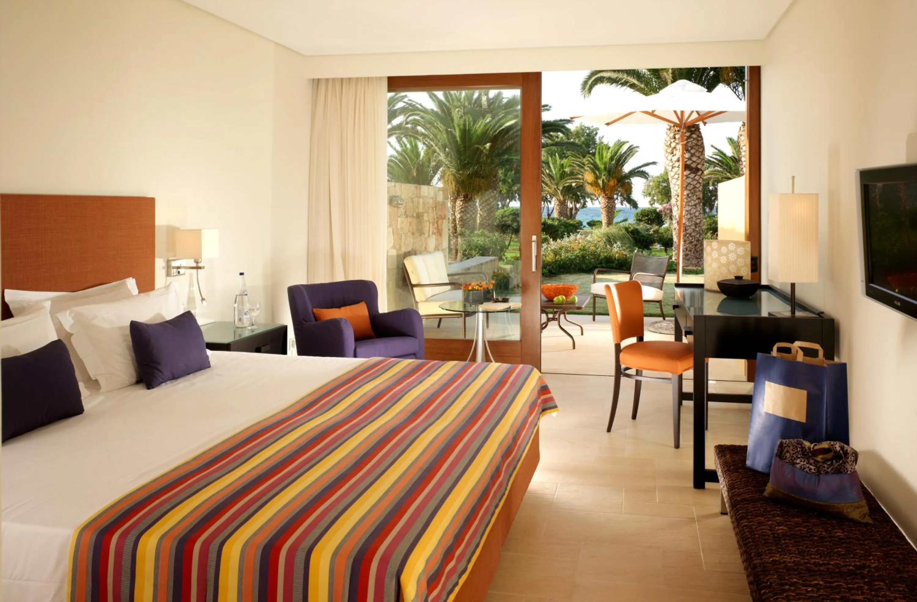 Patio, Bed in Kernos Beach Hotel & Bungalows