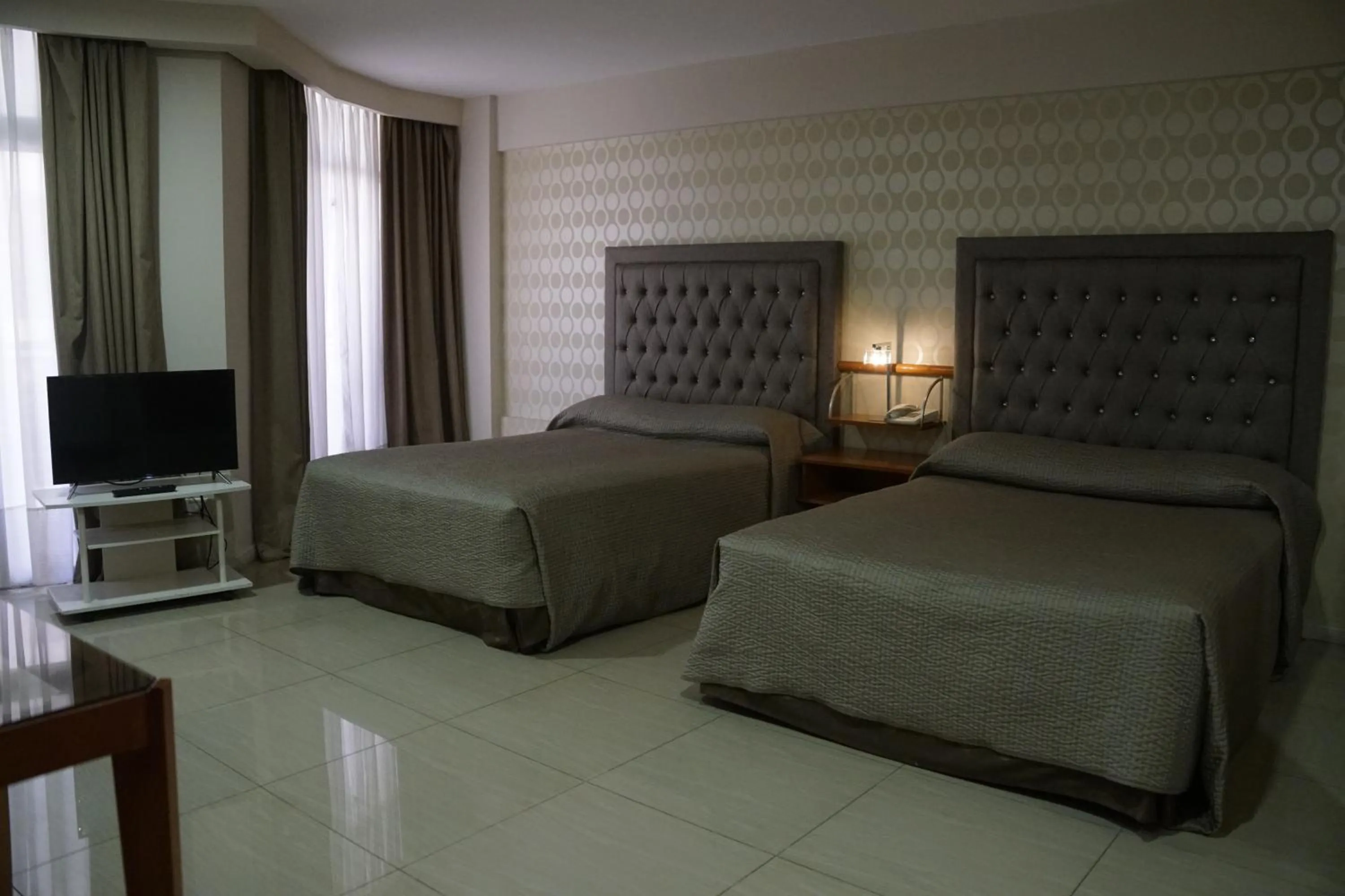 Bed in Hotel Howard Johnson Rosario