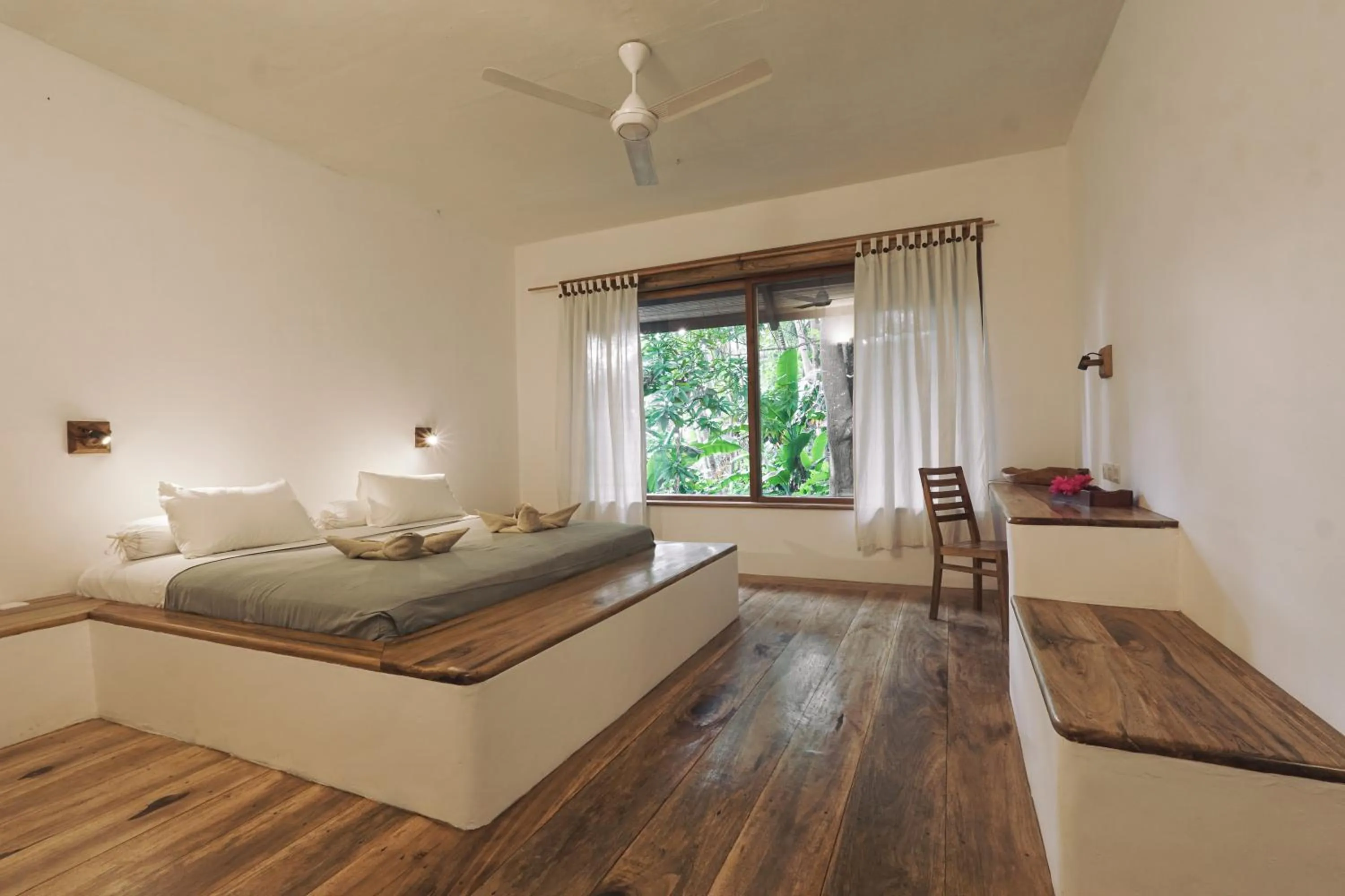 Bedroom, Bed in Coral Eye Boutique Resort and Marine Outpost