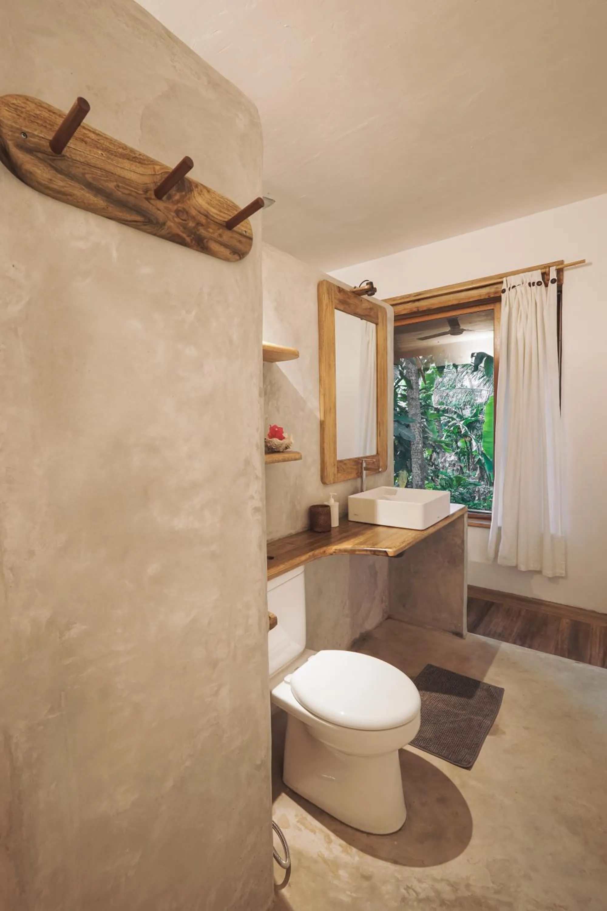 Toilet in Coral Eye Boutique Resort and Marine Outpost