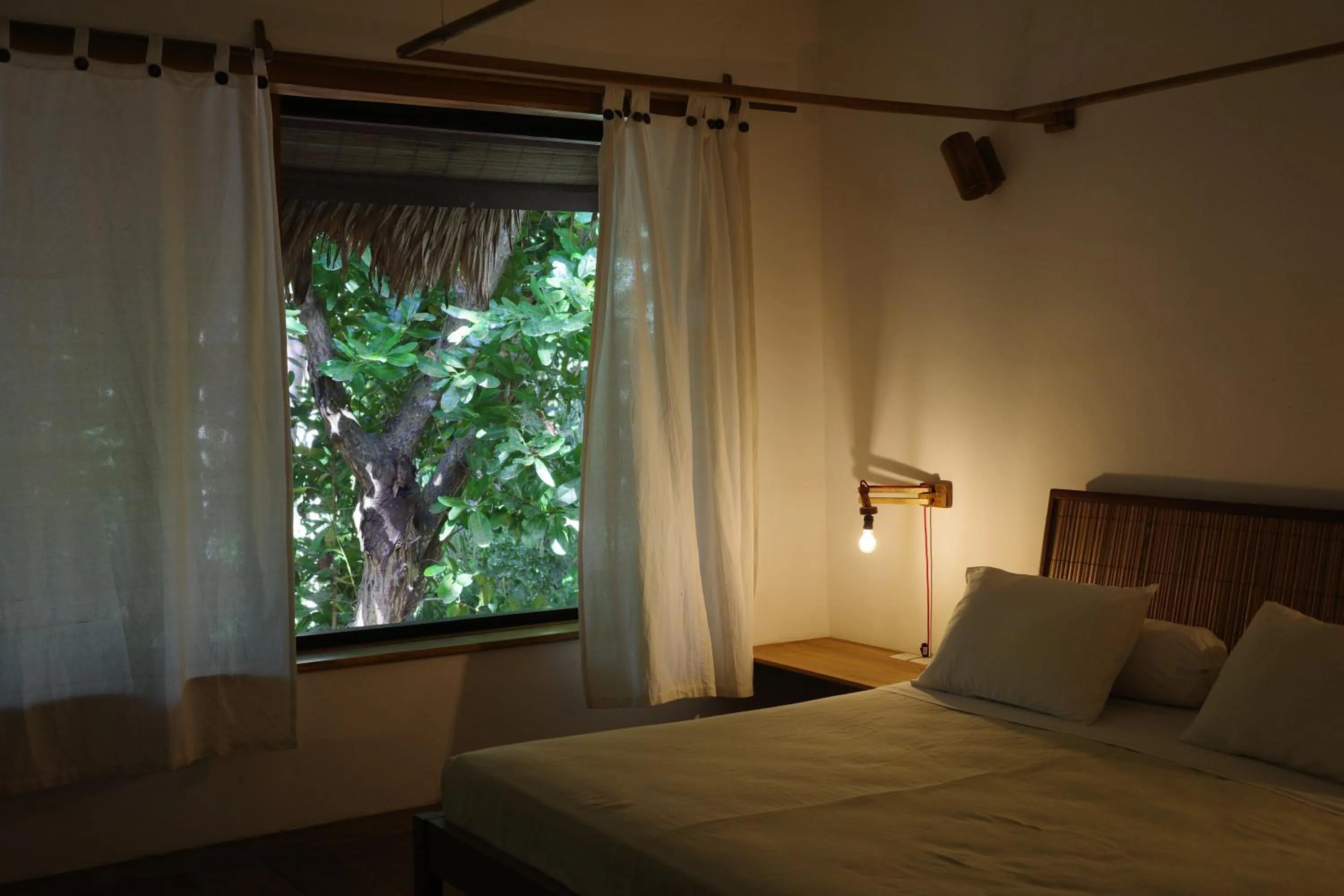 Bedroom, Bed in Coral Eye Boutique Resort and Marine Outpost
