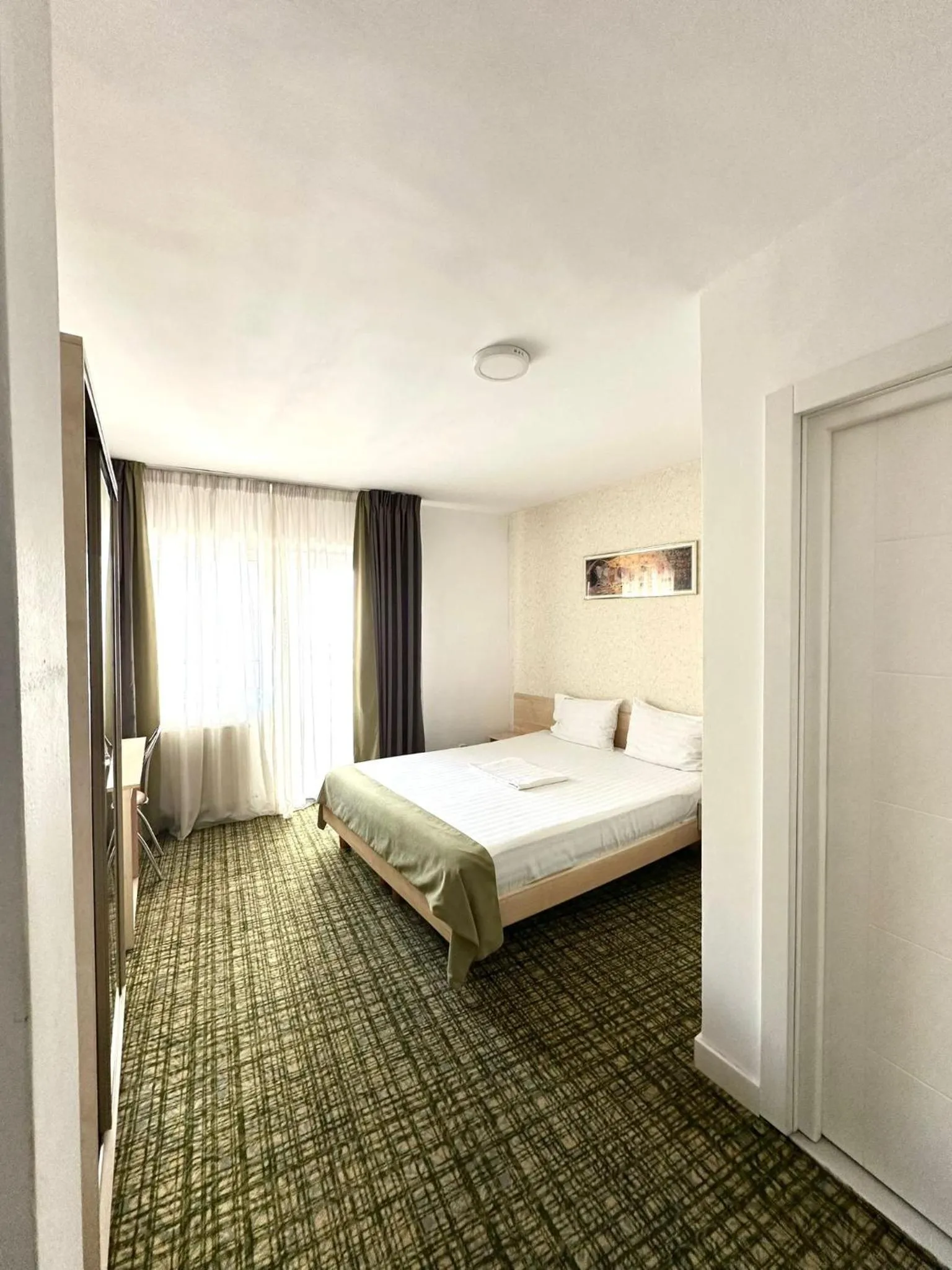 Communal lounge/ TV room, Bed in Casa Gabriela