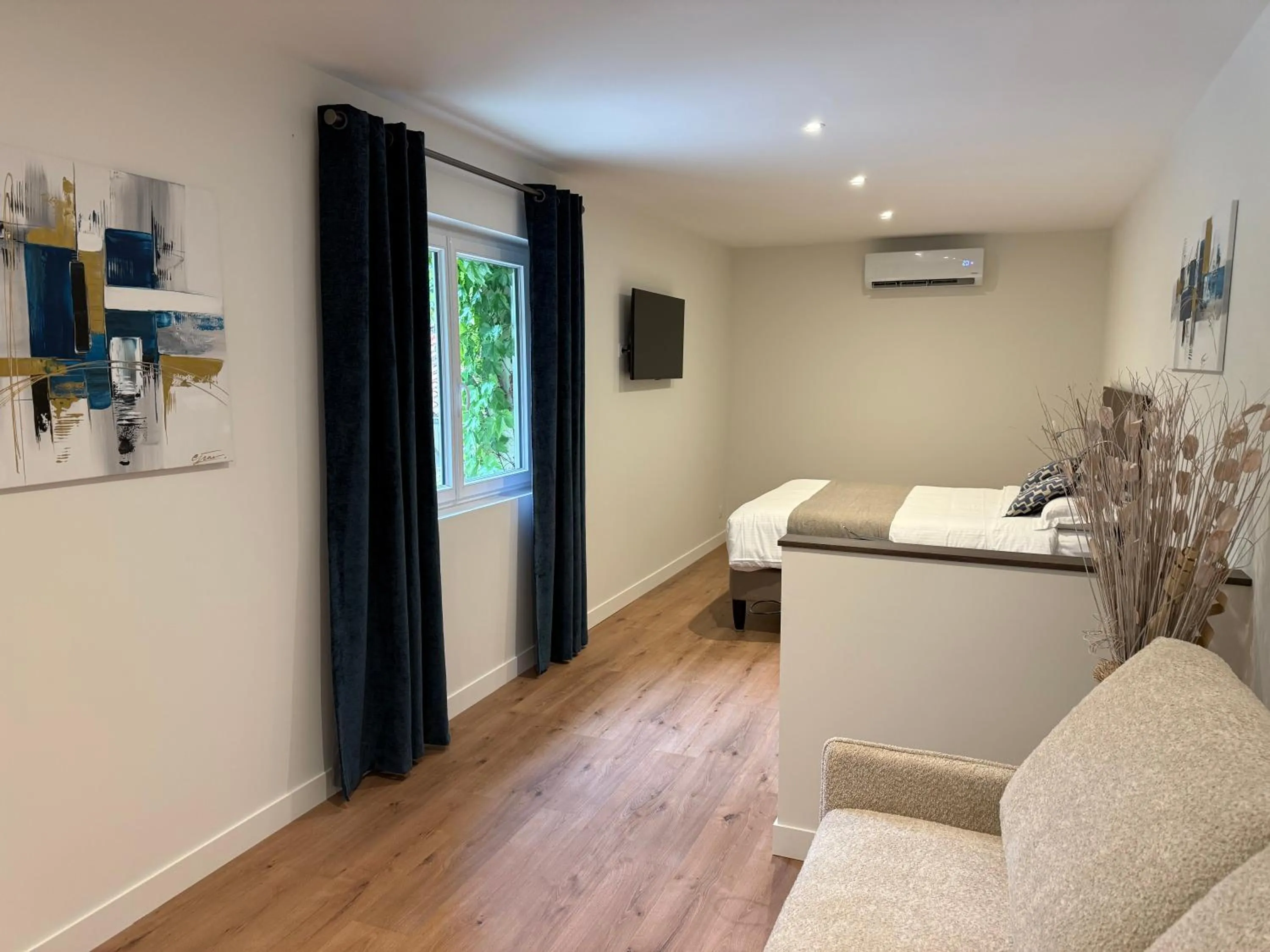 Seating area in Logis Hotel Le Petit Casset