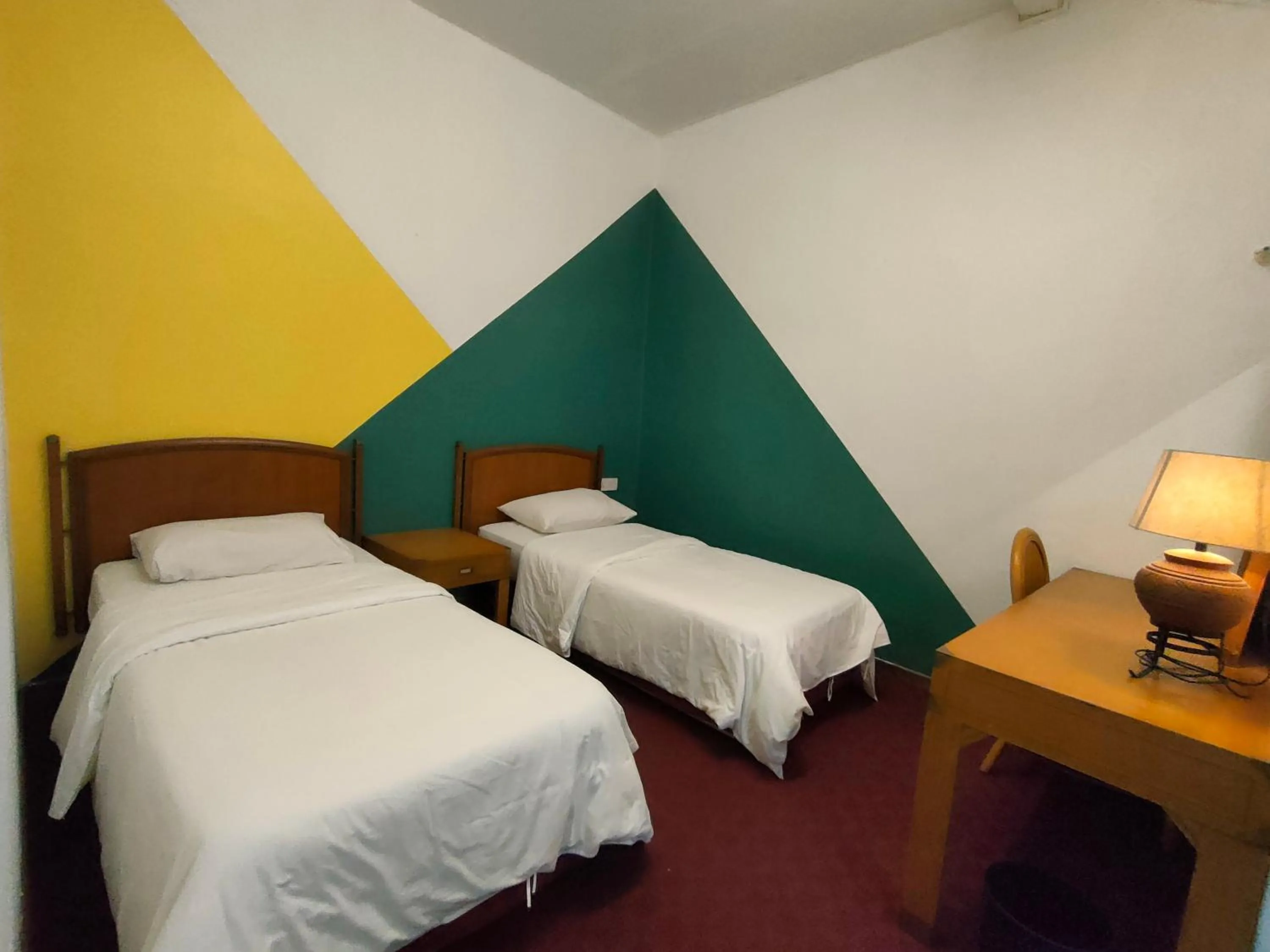 Bed in Heeren Inn Melaka