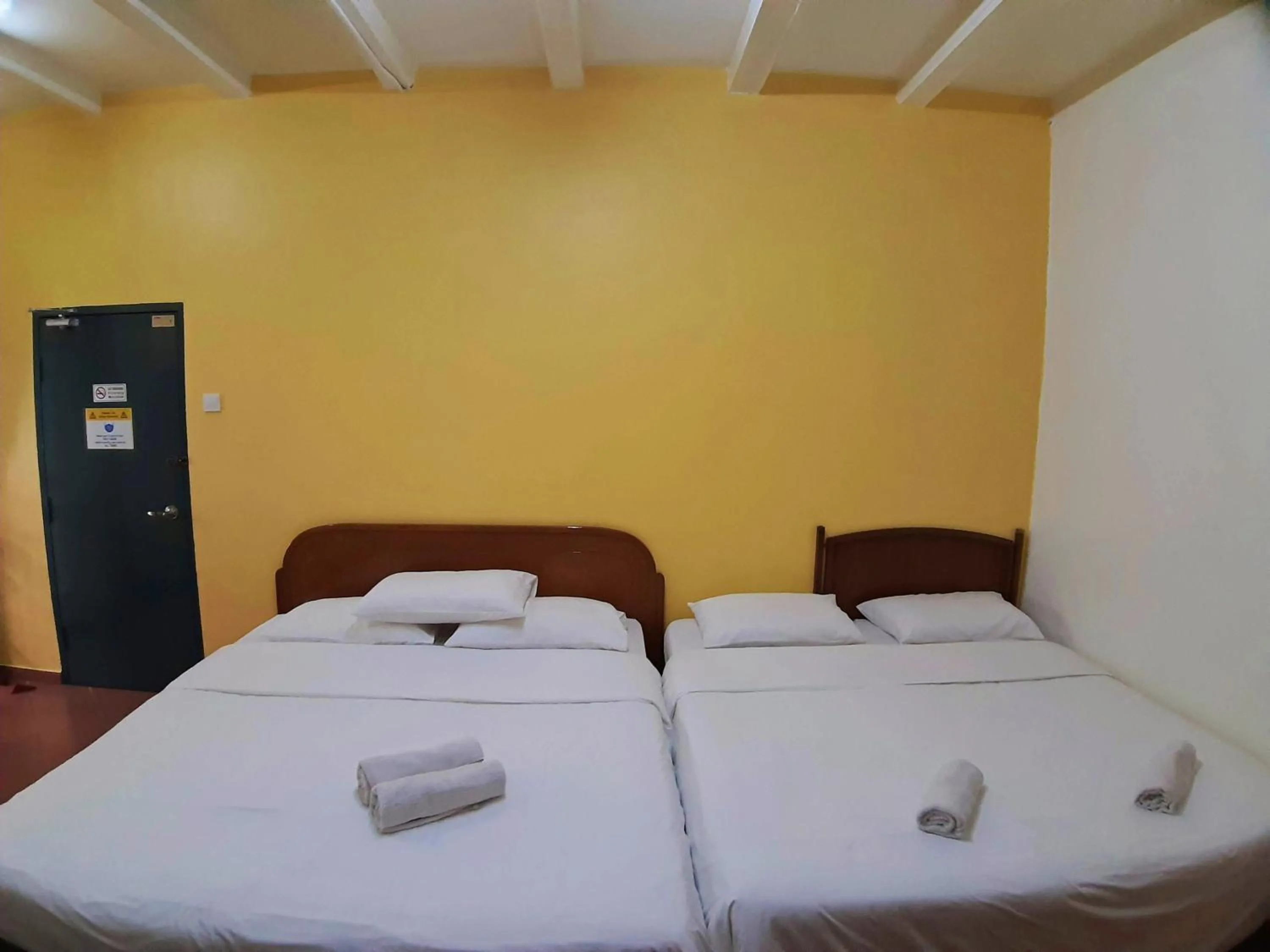 Bed in Heeren Inn Melaka