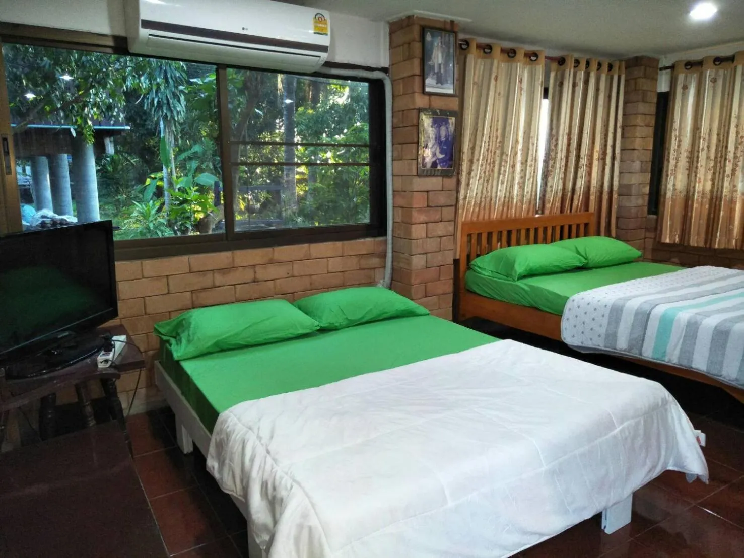 Bed in Oui Kaew Homestay