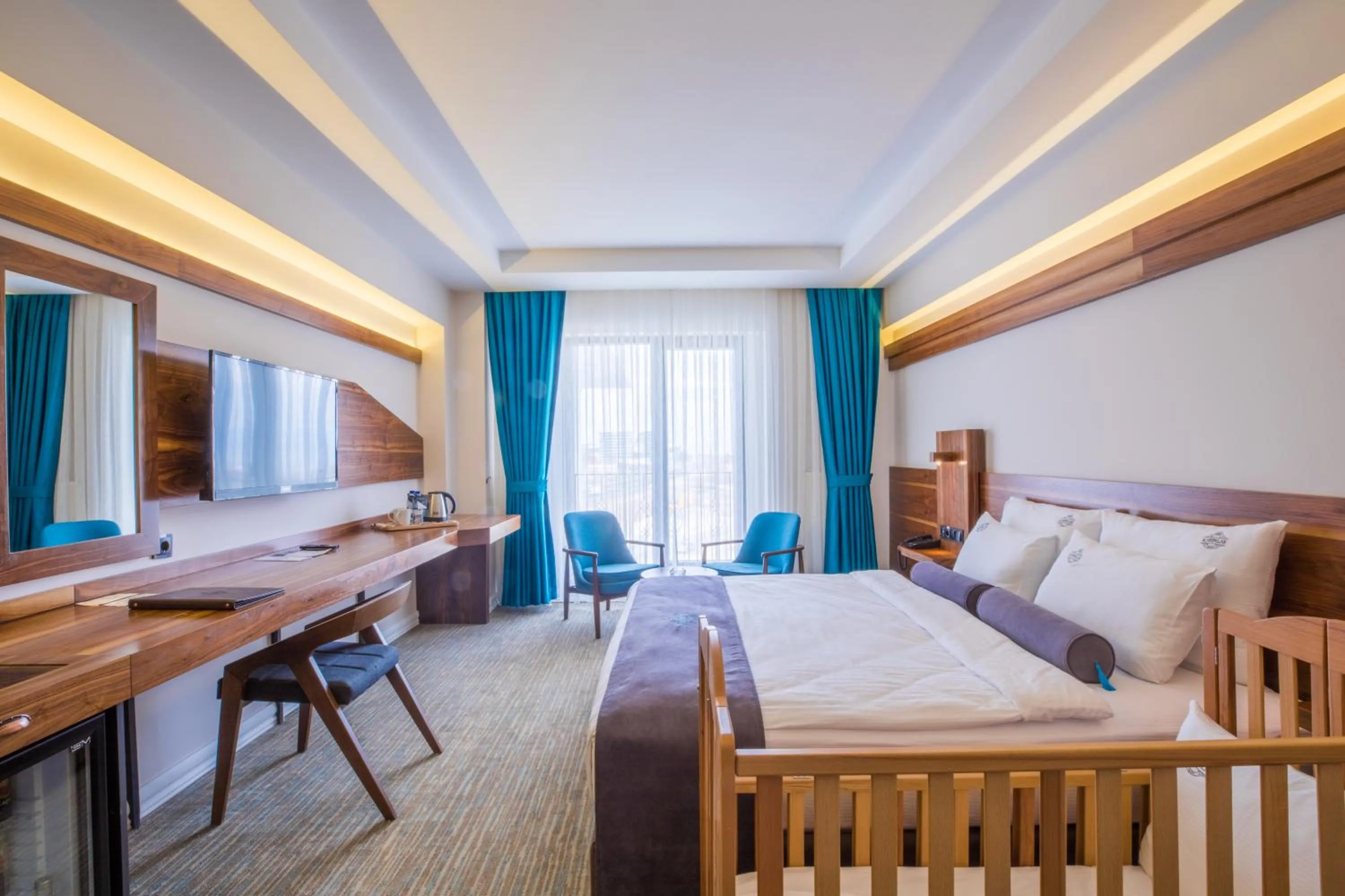 Bed in Karpalas City Hotel & Spa