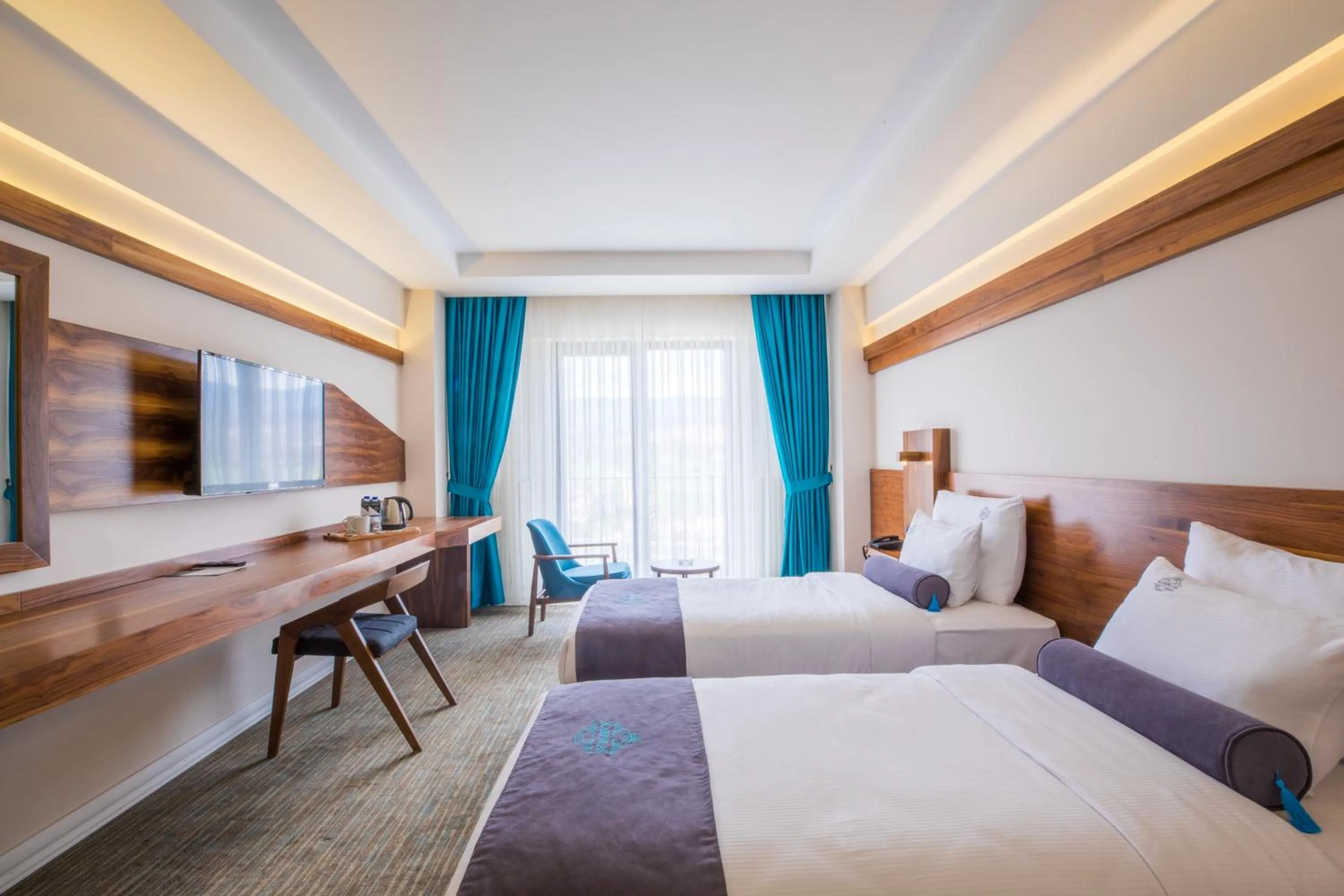 Bed in Karpalas City Hotel & Spa