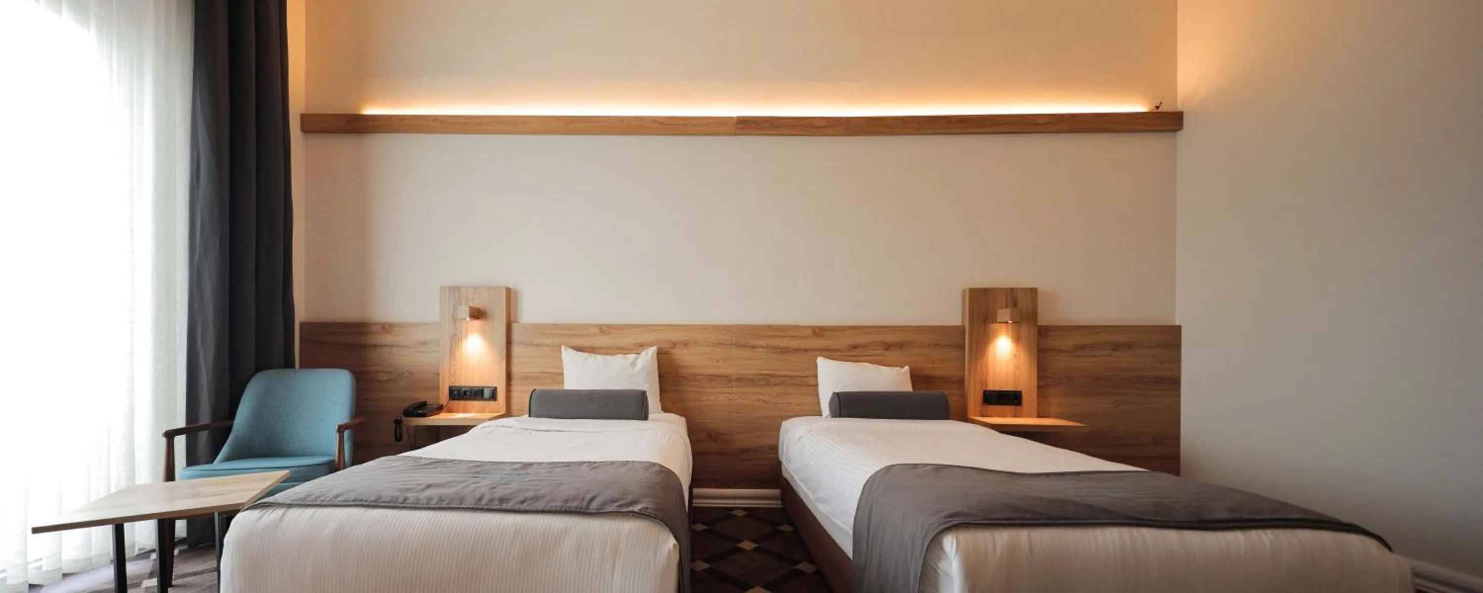 Bed in Karpalas City Hotel & Spa