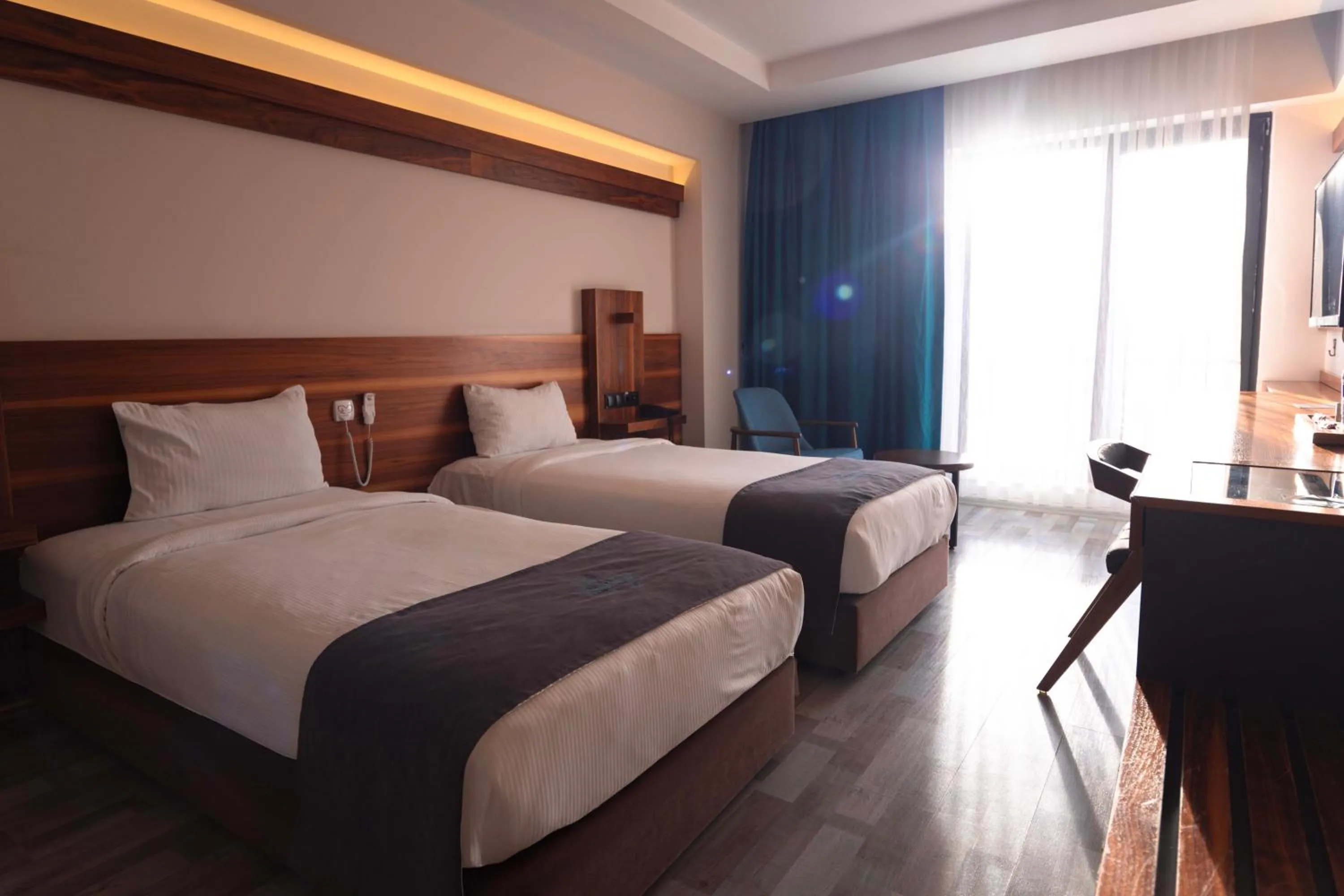 Bed in Karpalas City Hotel & Spa