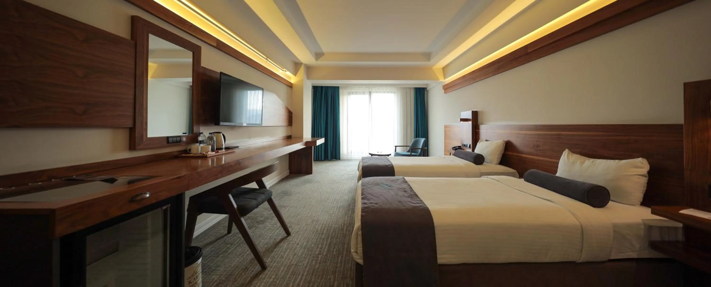 Bed in Karpalas City Hotel & Spa
