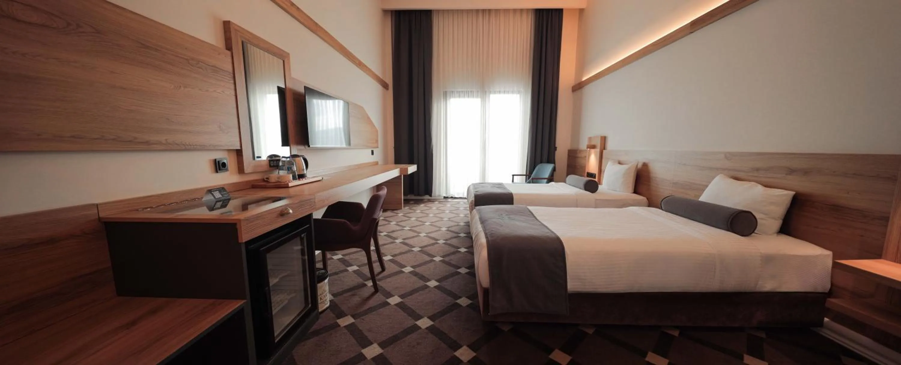 Bed in Karpalas City Hotel & Spa