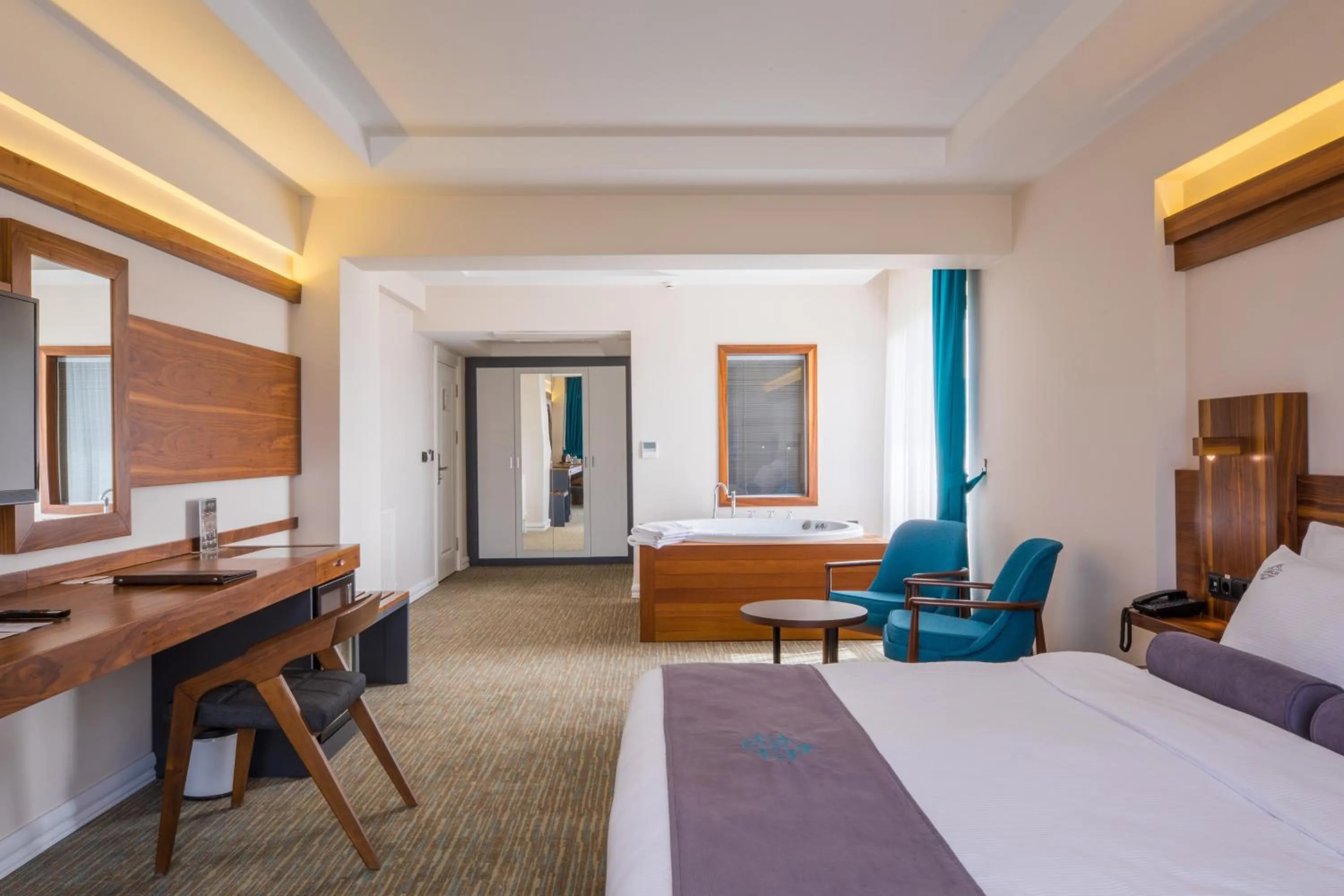 Bed in Karpalas City Hotel & Spa